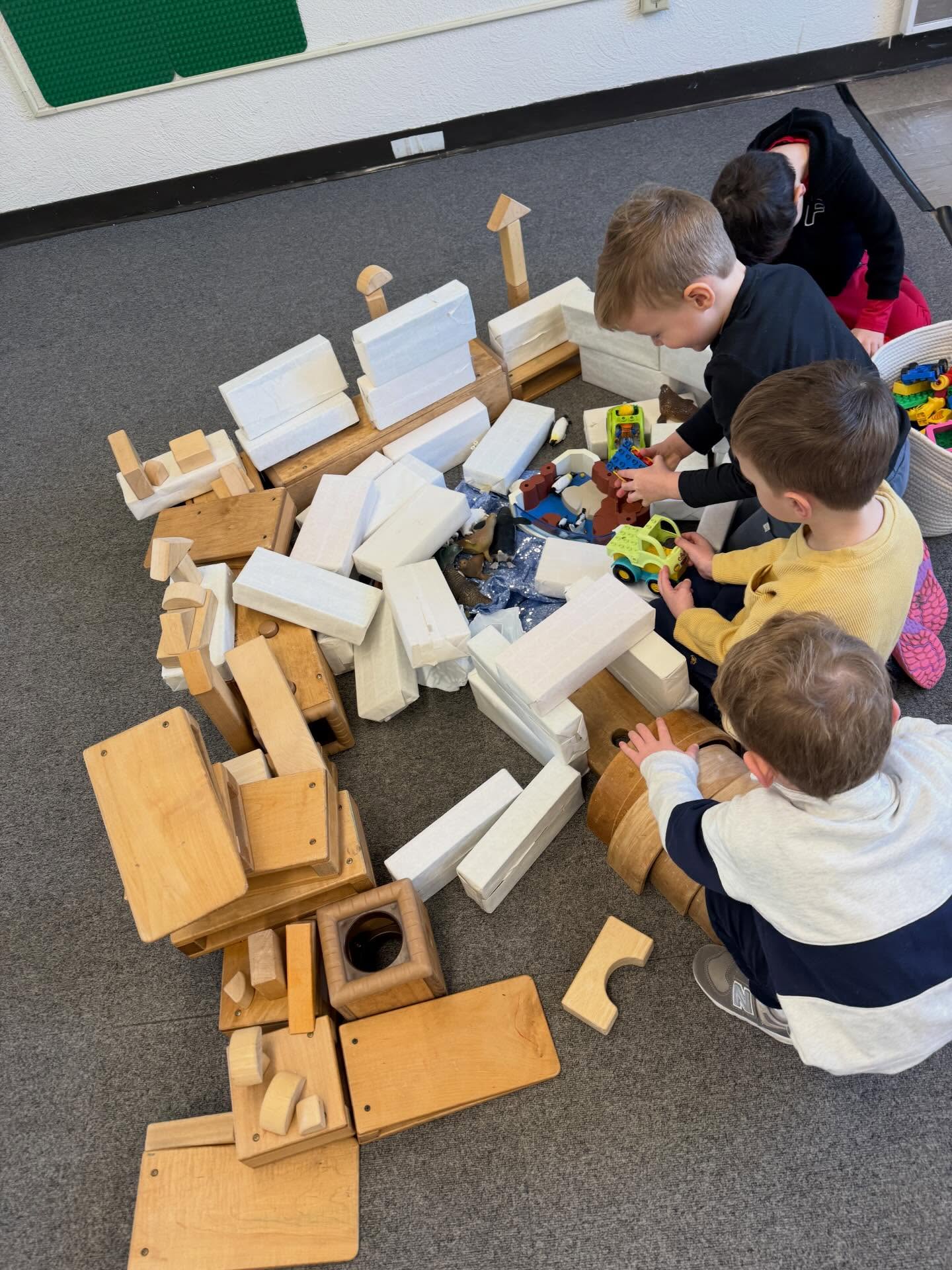 Imagination + Teamwork + ALL the blocks from the block shelf made this Arctic World come to life