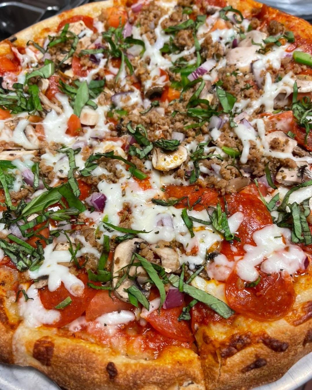 Order Up!!! Build your own pizza with pepperoni, house made sausage, cremini mushrooms, red onion and garnished with fresh local basil… #pizza #hiddengem #20years in the Pizza Game