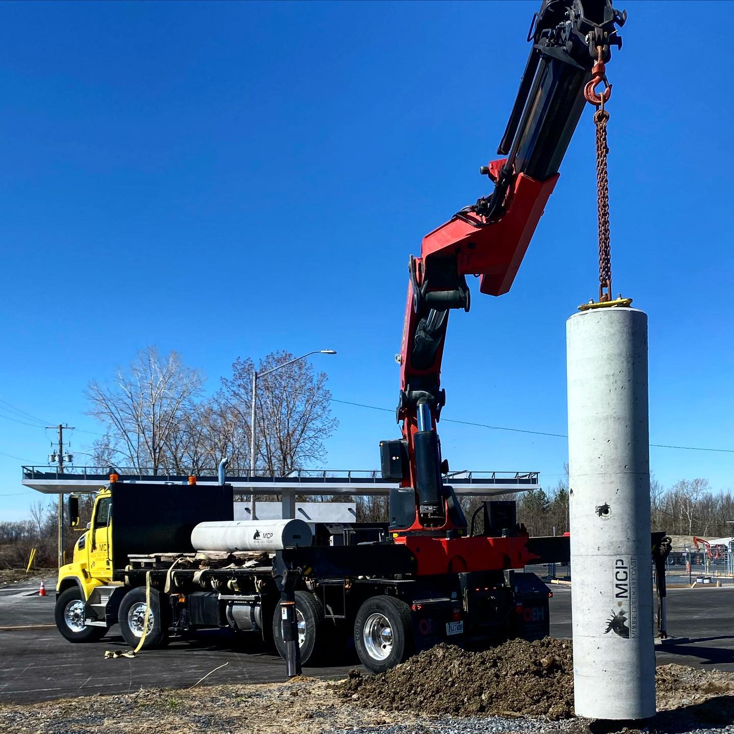 Some 24” diameter by 10’ light pole bases delivered and installed yesterday at a new gas station. #MCP #moosecreekcementproducts #precastconcrete #precastlightpolebase #candianmade #construction #ottawaconstruction #concrete #palfinger #westernstar #boomsup