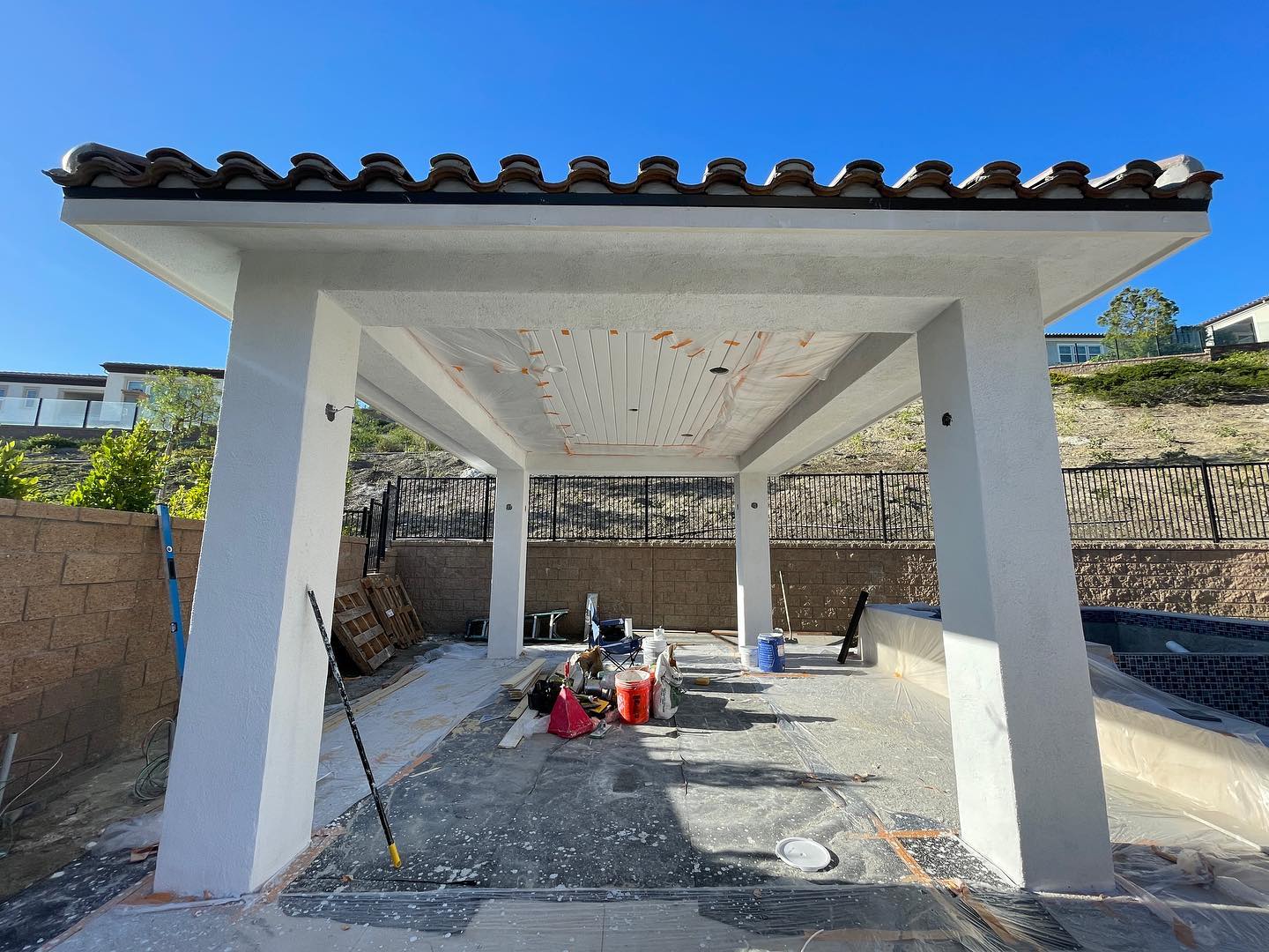Covered outdoor kitchen in progress. #calilife #caliliving #outdoorliving #outdoorlivingspace #landscapedesign #landscaping #backyard #backyarddesign #backyardideas #backyardprojects #generalcontractor #designandbuild #pooldesign #swimmingpool #orangecounty #oc #oclife #oclifestyle #ocliving #luxuryexteriors #luxuryoutdoorliving #glamscape #glamscapeoc #luxuryhomes #luxurydesign #luxurylandscapes #yorbalinda #yorbalindarealestate #yorbalindalifestyle #yorbalindarealtor