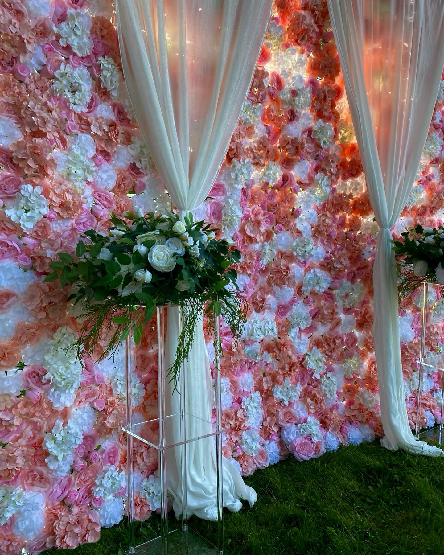 The theme of our 2024 new additions… florals, florals and more florals! 🌸 🌹🌻 We have 4 new floral walls you can find on our website
Floral walls can be rented with your choice of colour in fabric add-ons draped in front or to the side to increase on the 8ft width
Photo featuring our pink and white floral wall, white velvet curtains, acrylic plinths and floral balls