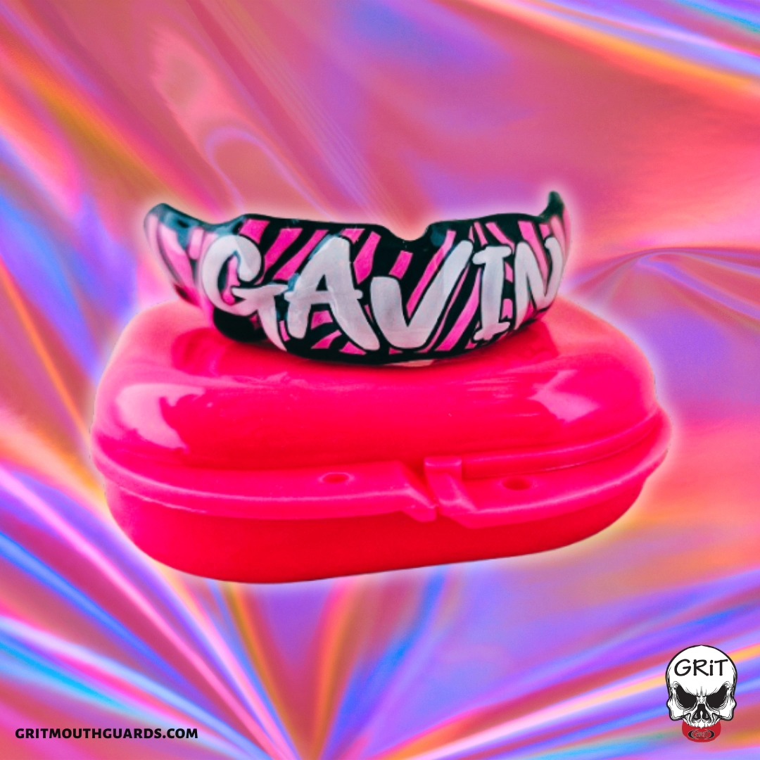 Hot pink zebra stripes custom mouthguard. www.gritmouthguards.com #gritmouthguards #mouthguard #zebra #zebrastripes