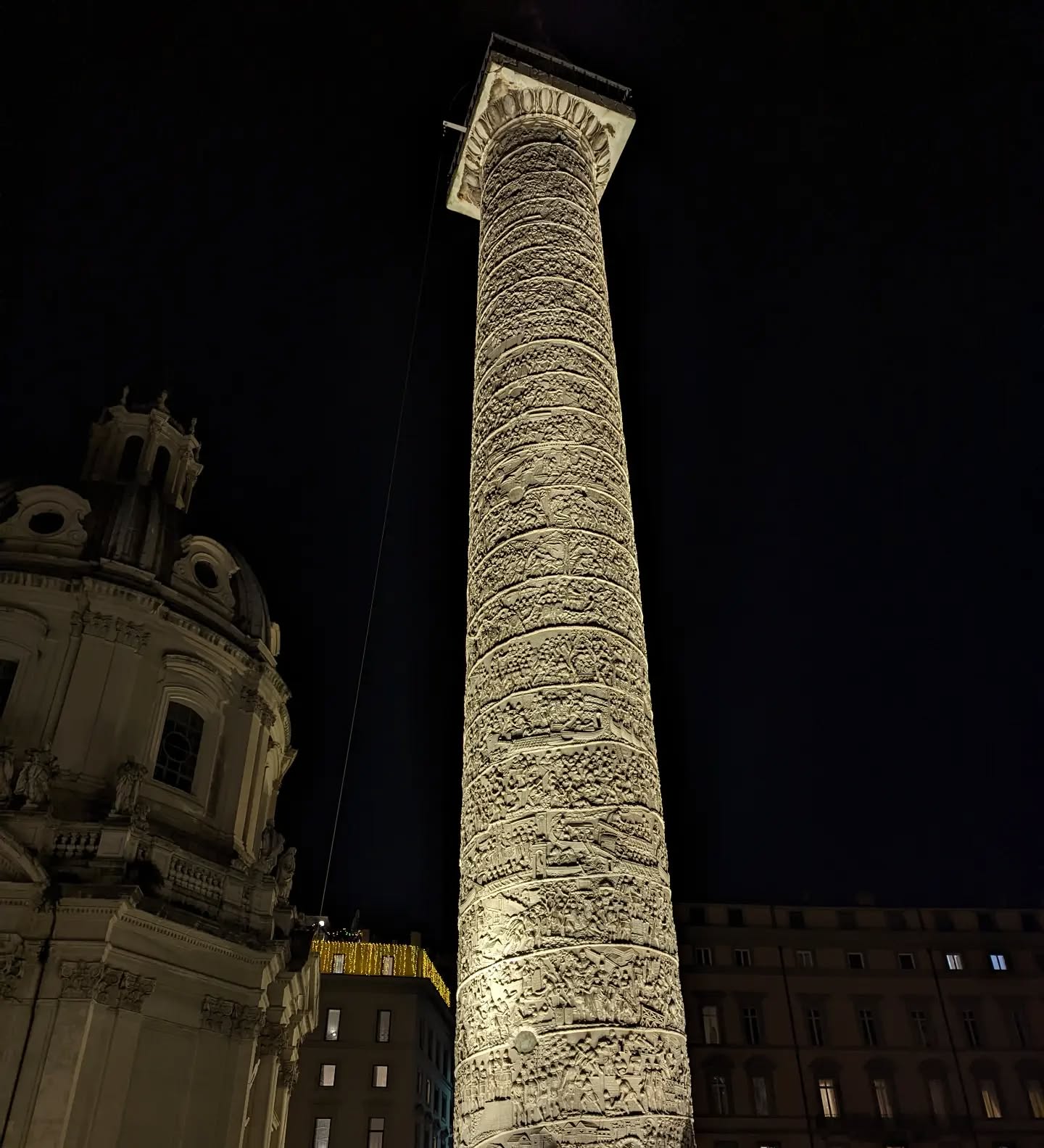 The Column of Trajan looks majestic at night. Of course, I understand the Romans would not have seen it lit up like this at night, but it makes for a great walk in the evening with a bite of gelato! #latinrocks #trajanscolumn