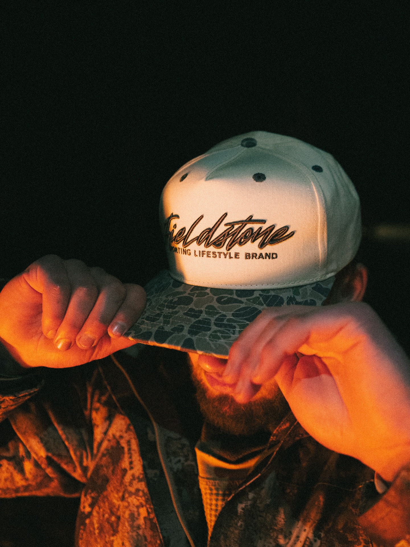 Backwoods camo on the brim. Built for nights like this.🪵
•
•
•
#trending #explore #fieldstone #campfire #outdoors