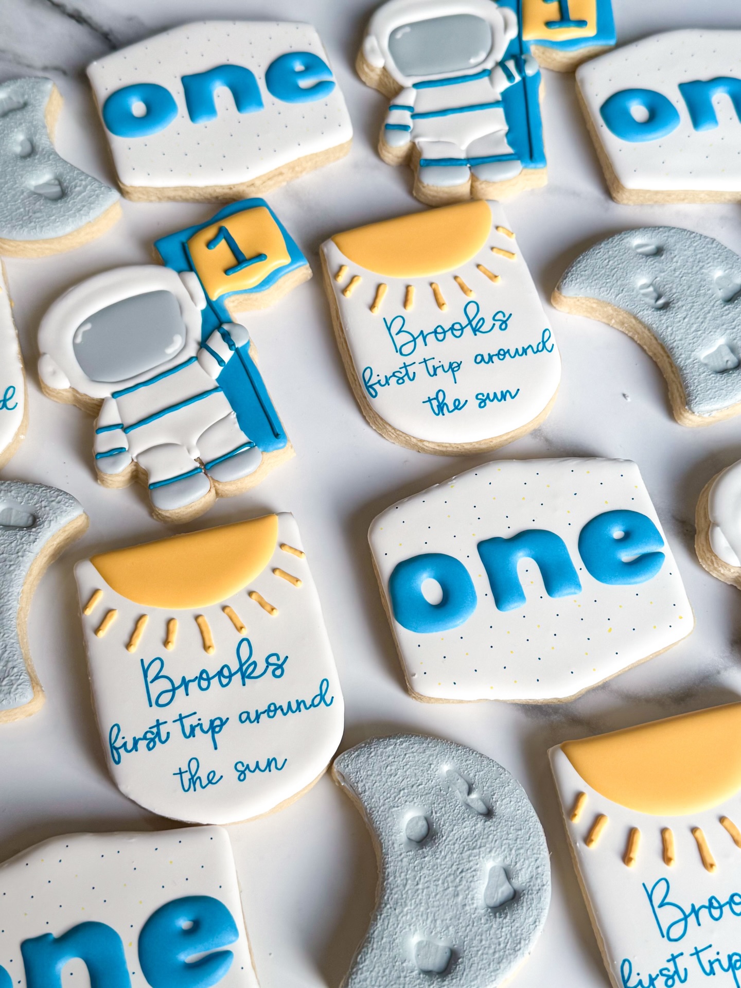 The most popular event I do cookies for is birthdays, in particular first birthdays! First trip around the sun has been the most popular first birthday theme over the last three years. While it’s been the most popular theme, every order has been different in the designs which makes it so fun! 😊