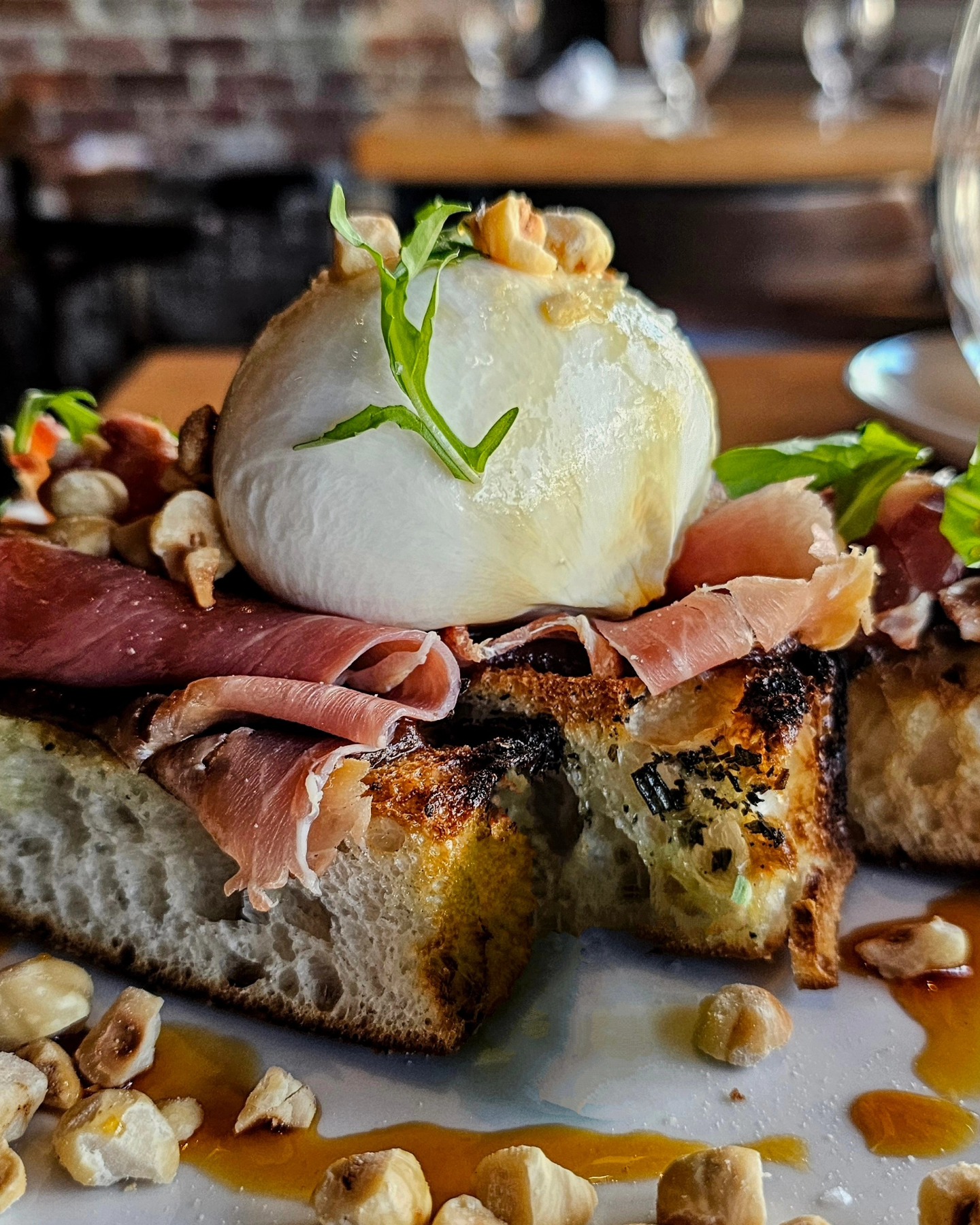 BURRATA AFFINATO
ciabatta, prosciutto, burrata, apple butter, toasted hazelnuts, pine bud syrup