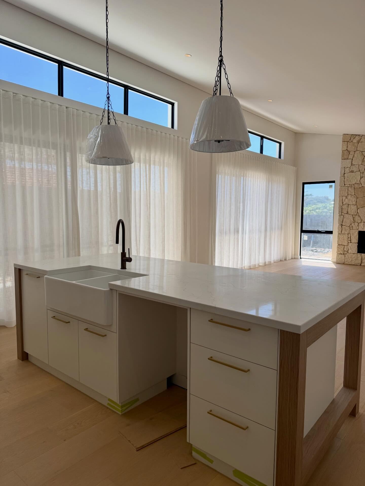 New build new install. Heavier textured linen blend sheets offering privacy at night without having to install blockout curtain or blinds behind. Keep it simple. Sheers from our Thomas Aldworth Textiles collection | #windowtreatments #curtains #curtainsdesign #drapes #windowstudio
