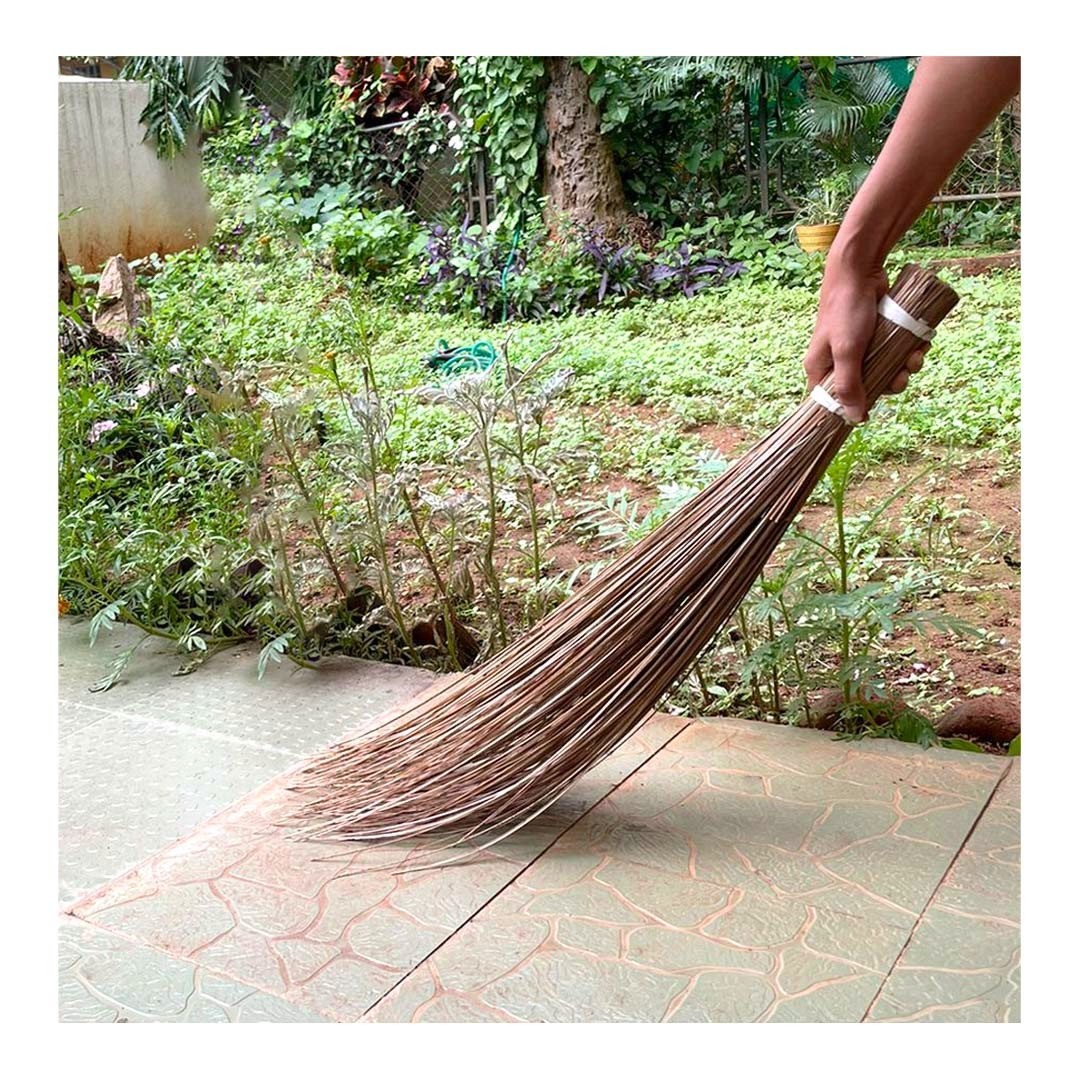 Coconut Stem Broom
.
Object / Utility Product
A broom is the most common household object found in every house. There are many broom varieties, and the most common of all is the Coconut Stem Broom, also known as "Eikkimaar" in Tamil. These brooms are cheap, and easy to make. Usually, in Indian households, two kinds of brooms are used, one is a hard broom used to sweep outdoors, and another is a soft broom used to sweep indoors. The Coconut Stem Broom falls in the first category.
These brooms are made from the stem of dried coconut leaves fallen off the tree. The dried leaves are stripped off, and a handful of the stem is tied together to make this broom. They are usually tied with jute rope so that they can be tightened even if a few stems fall off. These brooms are usually made at homes in villages where men and women, mostly old people, sit together to make them and gossip to spend their time and make a few bucks in the process.
Though majorly used to sweep outdoors, Indians use these brooms for all sorts of work, and the most common is found in hotels to wipe off the piping hot griddles. Since these brooms are made from fallen dried coconut leaves and are used till they are three-quarters their initial size, making them one of the well-used objects without wastage.
Photography @the_earthysoul
.
.
EDA is a crowdsourced archive of Everyday design from the Indian Subcontinent.
Follow @everydaydesignarchive for more.
.
.
.
.
.
.
.
.
.
.
.
.
.
.
.
.
.
.
.
.
.
.
.
#design #everyday #dailyobjects #designerobjects #homemade #artisanal #craftsofindia #artistsofindia #designarchive #indiansubcontinent #india #productdesign #householdobject #everydaydesignobjects #coconutbroom #householditems #coconutbroomstick #sustainability #ecoliving #outdoorbroom #organicgardening #greencleaning #ecobroom