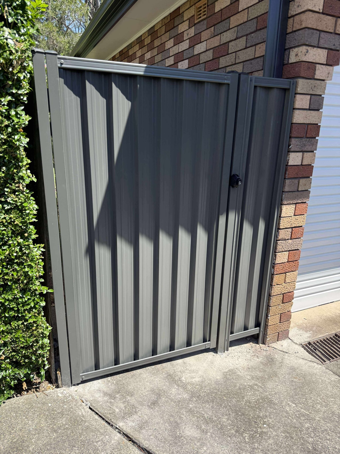 Nice, simple gate and we couldn’t be happier with how it turned out. The cement set up solid and were very happy with the final result.
This homeowner has a sturdy gate that will stand the test of time for decades to come.
