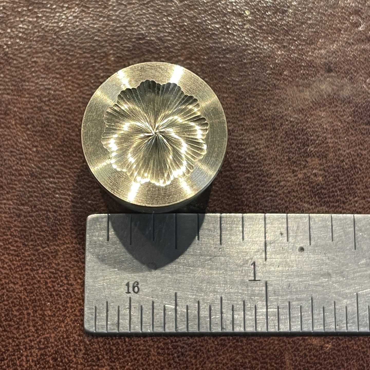 Honey can you make me some brass rods to hang things on in my two cabinets? So I dug into some brass stock recently purchased for "Rosie" and came up with these. The knob parts were turned on the metal lathe from .75" 260 brass bar. The back plates were cut on the band saw, worked on the metal lathe and then to the Rose Engine lathe for hole layout. Of course we embellished the knob ends on the Rose Engine. 2 cabinets each with 2 sets of rods and different patterns on both sets. A fun project and someone was very appreciative. 💘😊