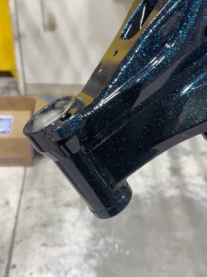 Surron E Bike frame Gloss Black with Chameleon Sapphire Clear. @prismaticpowders @jtscoatings #powdercoating #surronframe