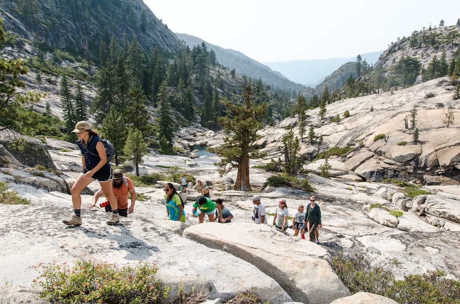 Are you looking for more than a typical summer camp experience for your youth group? Are you seeking challenge, scenic beauty, and an unforgettable, bonding experience for your group of students? Then the Backcountry might be the right trip for you!!
Our backcountry trip includes 4 days in the backcountry (6 mile hike in/out with backpacks, exploring, rock climbing, rappelling, and sliding down natural water slides!), and one day of white water rafting. Our backcountry package is our LOWEST priced 5 day trip— we do this on purpose! We want you to go!
We have been taking students backpacking in the beautiful Sierra Nevada Mountains for over three decades! Our groups often remark that their backcountry trip is an unforgettable experience that created a bond within their students that lasted for years following.
We love the backcountry and hope you do too!