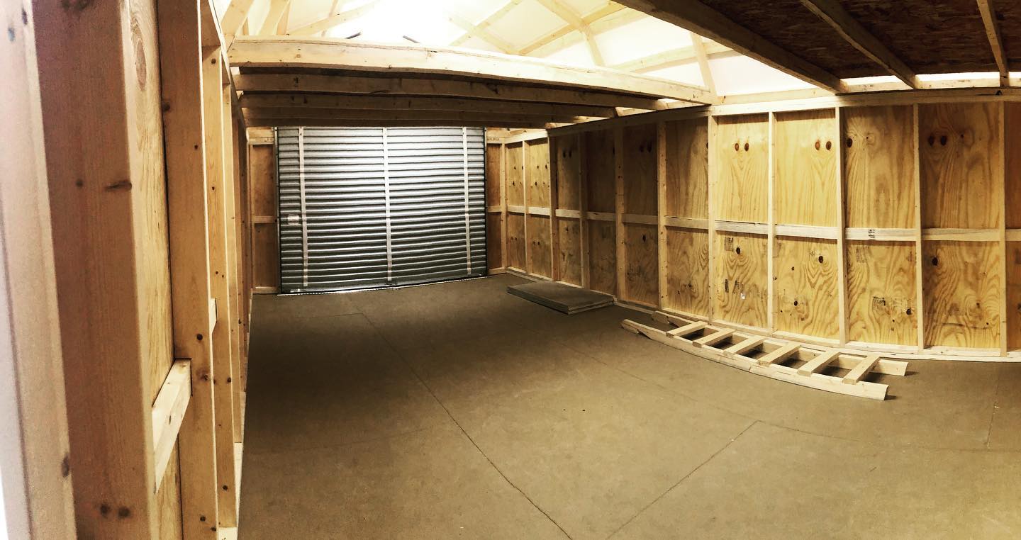 Just finished up this custom 12x24 lofted barn with a roll up door! Notice the real plywood interior, with number 1 grade European premium studs, and the standard ridge light & double bubble insulation for the roof. All loft buildings come with a custom made ladder as well. You will not find a shed that will last you longer than one from Kalona Mini Buildings! #kmb #sheshed #mancave #shop #garage #barn #utility #garden #gardenshed #minibarn #portable