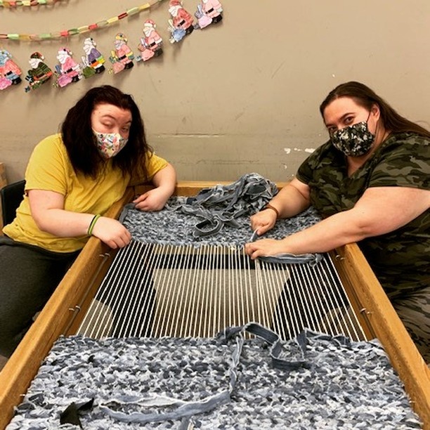 Suzie and Kari-Lynn weaving one of our beautiful denim rugs! These are one of several items we make and sell at our 122 10th Ave NW location.