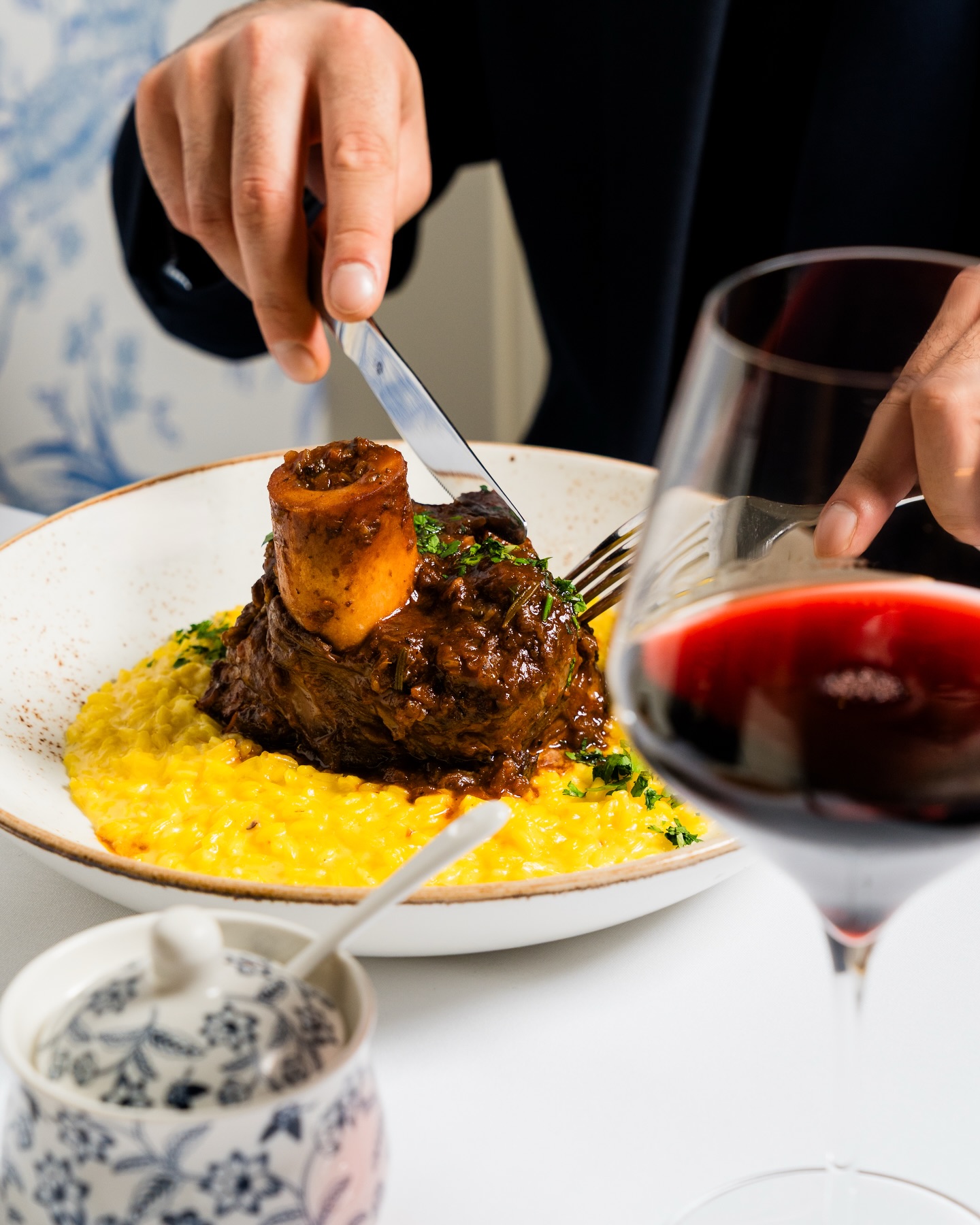Slow-braised veal shank served with saffron risotto and finished with gremolata. An Italian classic, crafted with care. Reserve your table tonight.