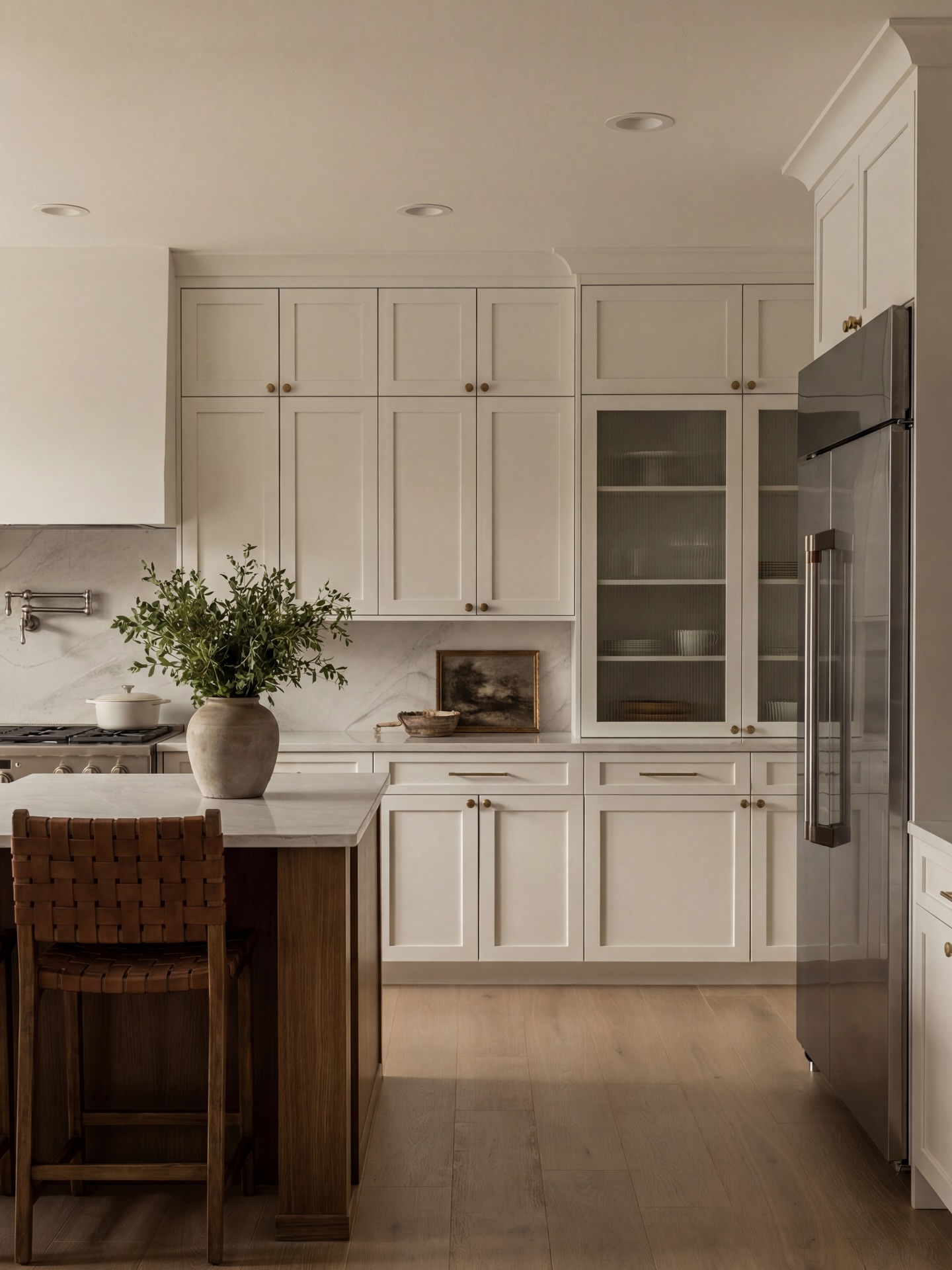 This kitchen from our recent project in the Fox Hollow development was truly one for the books. Every element was thoughtfully layered to create a space that feels warm, refined, and effortlessly functional.
Here are a few of our favorite details:
– Floor-to-ceiling custom cabinetry in a soft, warm neutral
– A built-in glass hutch with reeded panels for subtle texture
– Quartz countertops paired with a full-height slab backsplash
– A statement island wrapped in rich wood tones
– Integrated brass hardware that adds just the right amount of contrast
– Clean-lined trim and tailored millwork throughout
It’s a space that feels timeless the moment you step in. Head to our story for a closer look at this Fox Hollow beauty.
Home Layout - Coming Soon
#customhome #idaho #northidaho #pnwhomes #customhomes