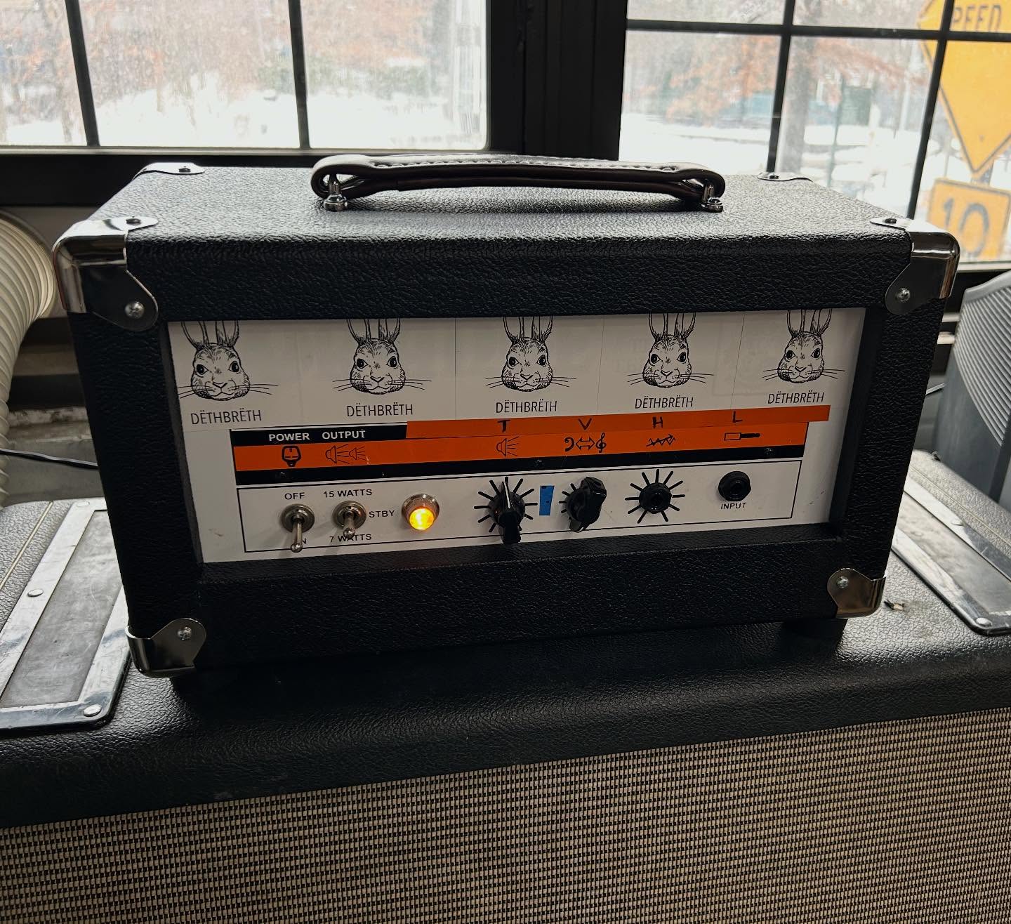 Newly built amp cabinet for this 18w clone housed in an orange chassis.