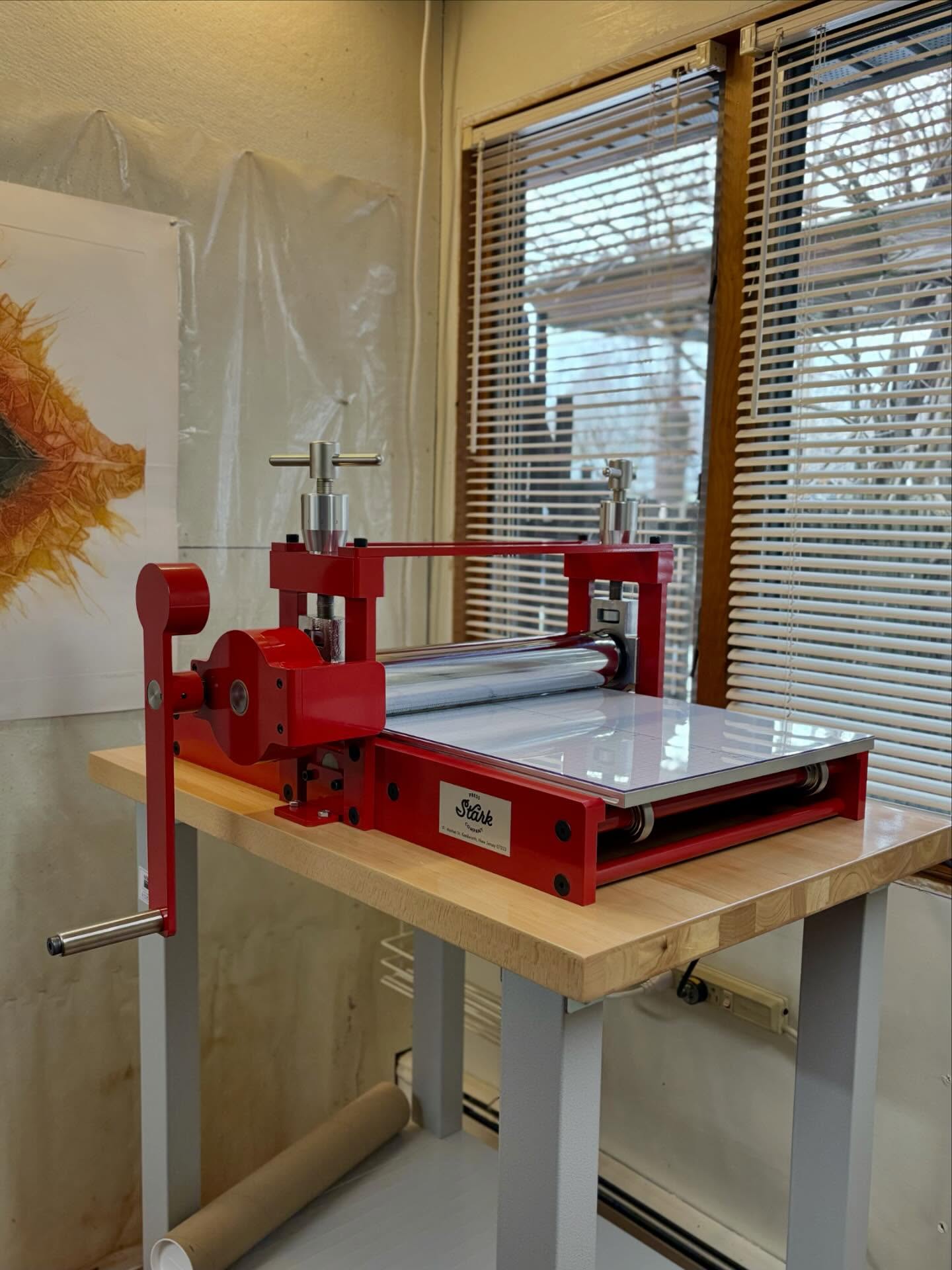 This morning we delivered a new fire red SPC-1630 etching press to a lovely printmaker in northern New Jersey. These presses are compact but mighty, and we’re so excited to see all the future work it produces. #starkpressco #printmaking #etchingpress #printingpress #printmakersofinstagram