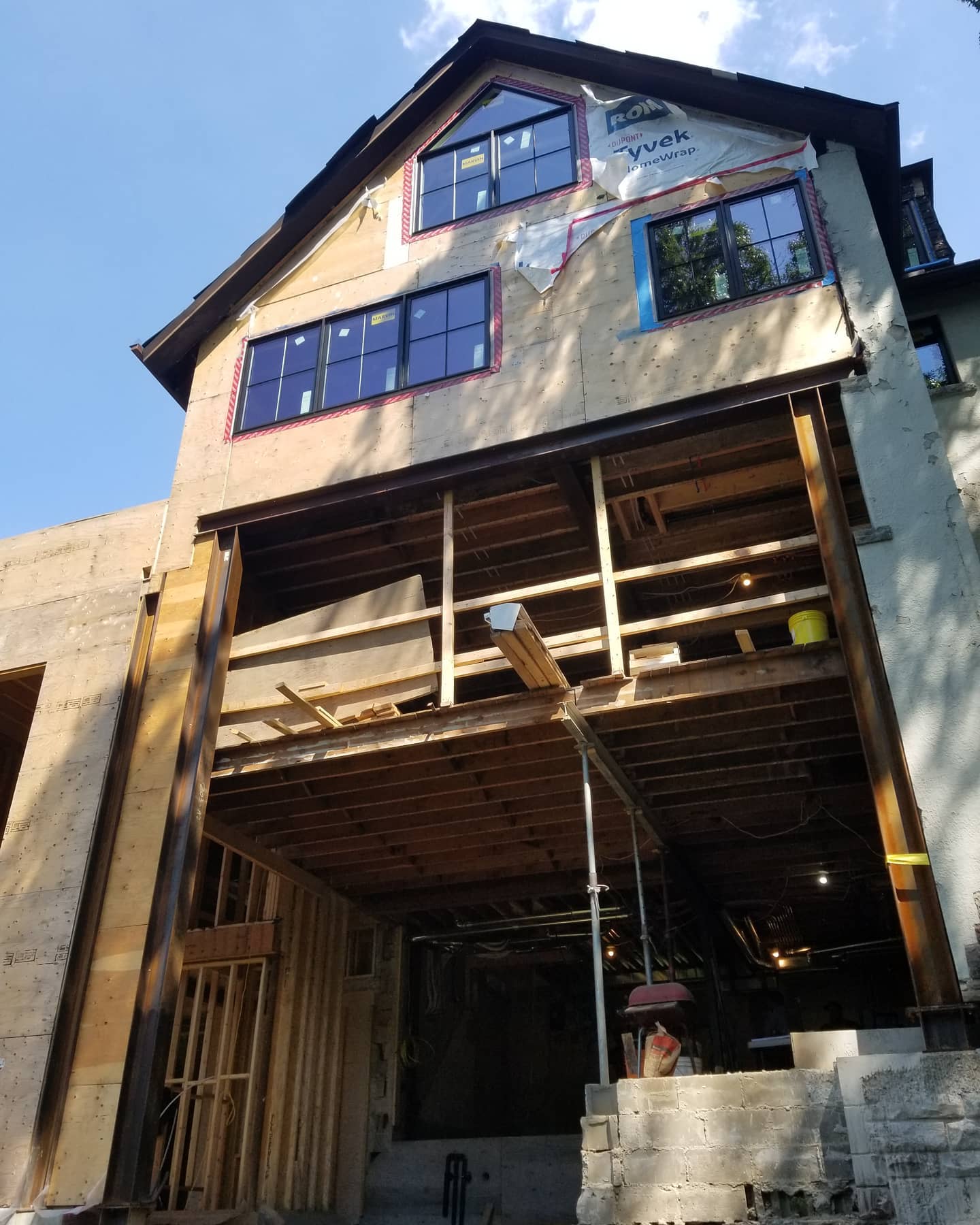 Site visit on Riverside Crescent this past summer. This 22' high structural steel frame provides lateral stability for the massive wall opening. This opening will eventually be fitted with a custom window/door sytem with views of the Humber River!