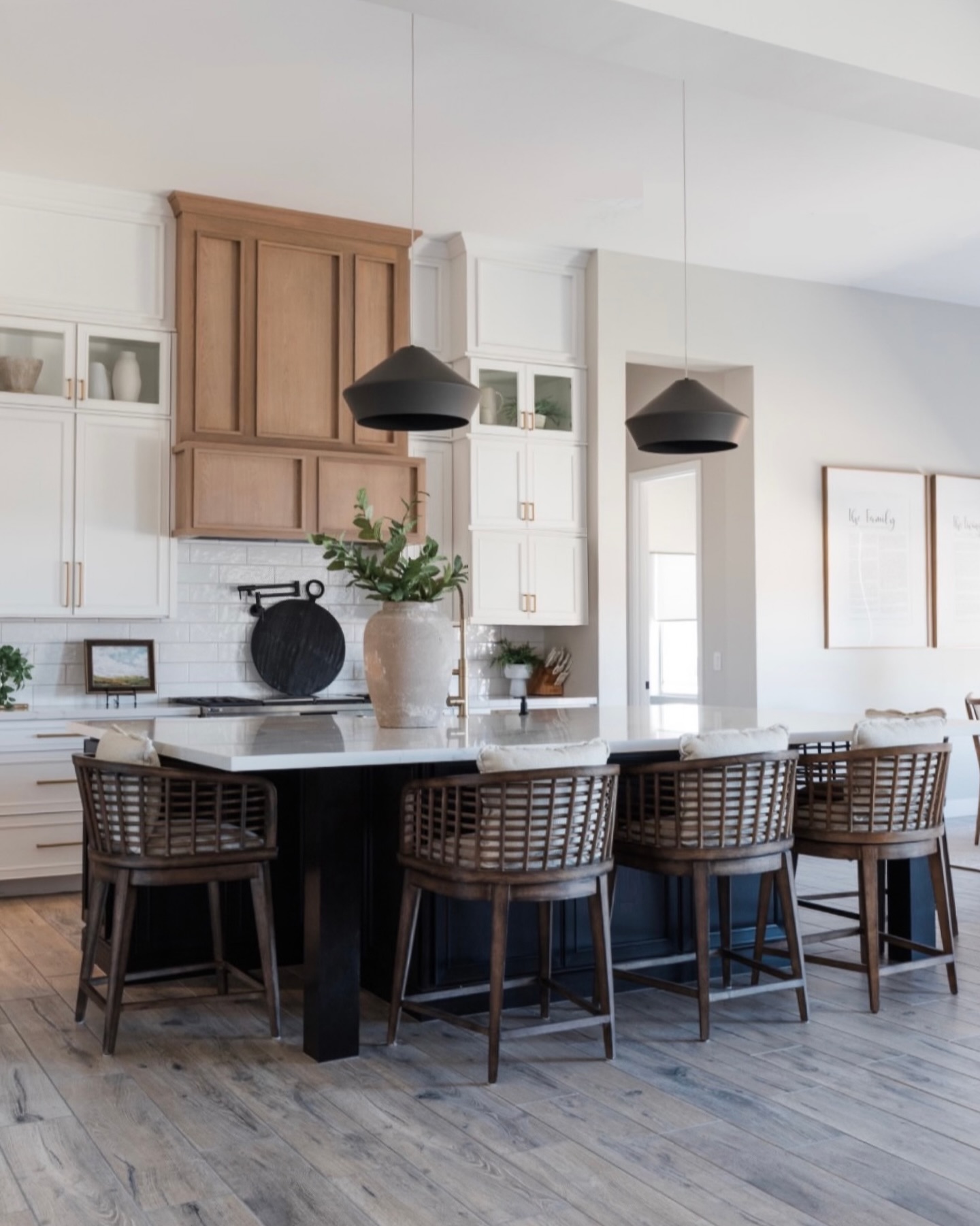 ✨This kitchen transformation is everything.
When our client moved to Arizona on short notice, she ended up with a tract home, but she knew she wanted her kitchen to feel custom, elevated, and truly hers.
So we completely reimagined the heart of the home. A custom wood hood that adds warmth and character, cabinetry taken all the way up for that built-in look, an extra-large island designed for gathering, layered lighting with statement pendants, and finishes that feel timeless but still personal.
The goal was simple: make it feel high-end, welcoming, and functional for real life.
It’s proof that even a builder-grade space can become something beautiful and intentional with the right details. And honestly… this is where the best memories are made