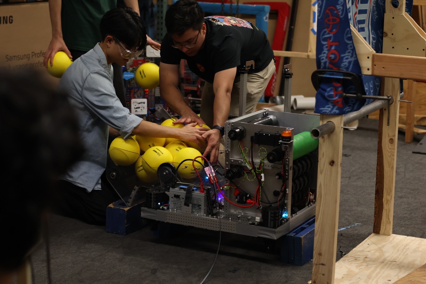 End of week 7!!
We are so close to finishing the robot! We just need to mount the container and fix some small issues with the intake. Over the next week, we will continue to fix small issues as they come up while we hand the robot over to software so they can start testing and fine tuning the robot.
Also shout out to our scouting team who published their scouting app and our visual strategy team for working on our pit and trading cards