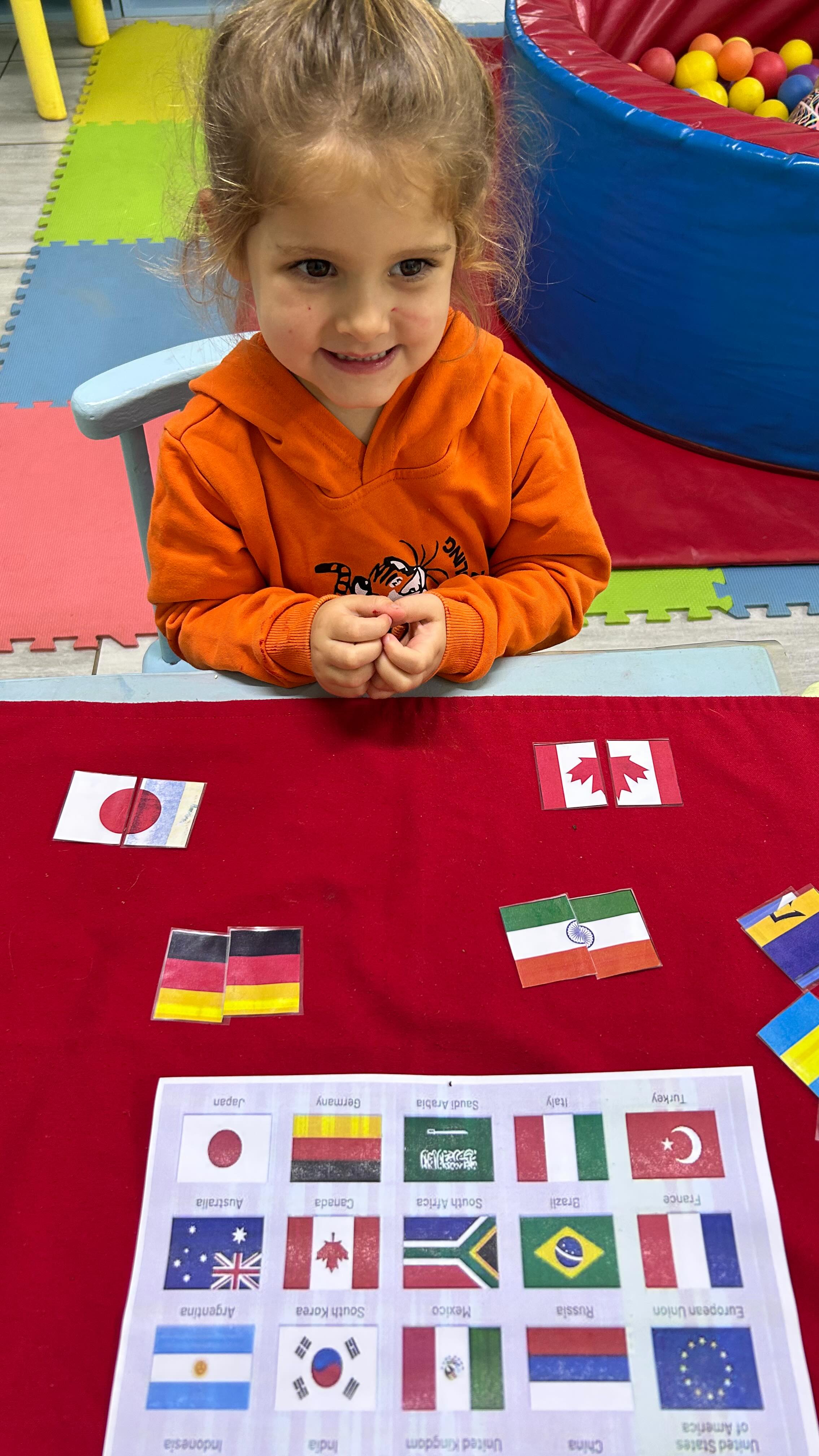 Hands on fun with flags and pegs! 🇨🇮Copying flag designs on the pegboard with focus and pride and matching patterns while putting flags together 🇾🇪 #preschool #montessoripreschool #playgroup #toddler #educator