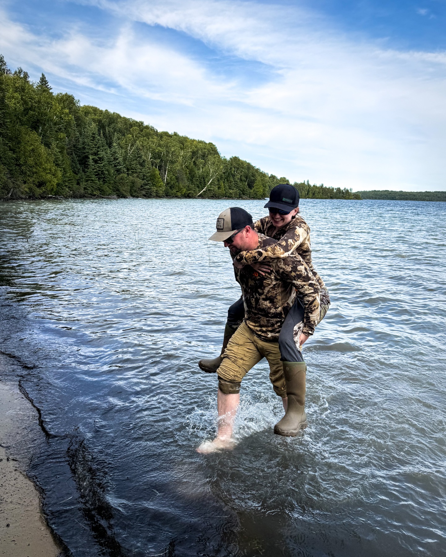 Chivalry is not dead ๐
That moment when you carry your wife across the water so her boots stay dry for the afternoon black bear hunt.
We see couples, dads and sons/daughters, siblings, small groups of friends sharing the whole experience: rods in the morning, tree stands in the evening, stories by the fire at night.
A few openings remain this fall โ DM us if this sounds like your kind of adventure.