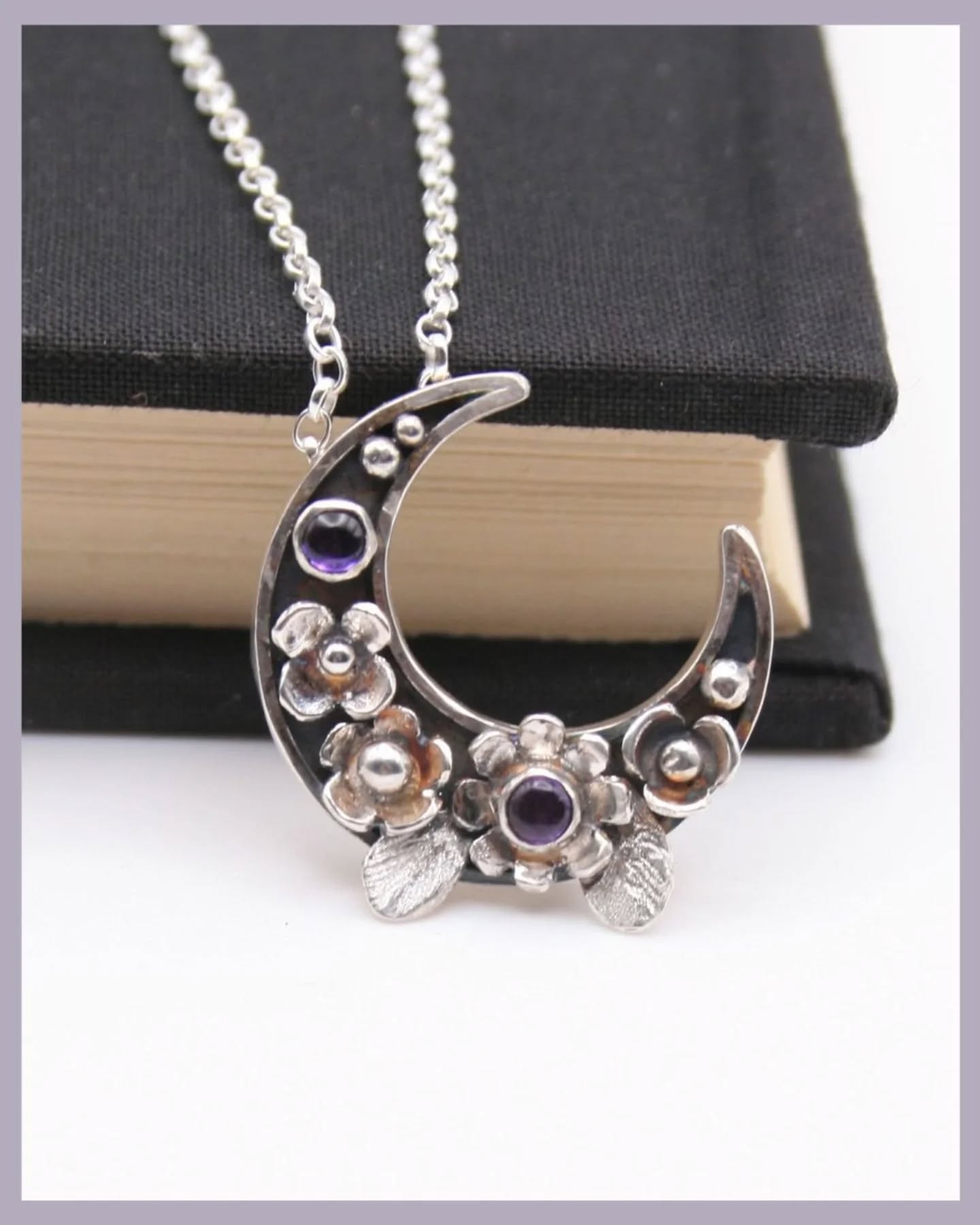 🌜 I’ve been working on a new piece with a whimsical vibe. The result is this sterling silver crescent moon which I’ve filled with little silver flowers and two amethyst cabochons.
🌜 One thing I’m always thinking about is what defines my signature style. I probably overthink it at times, but this piece definitely feels right, it’s delicate, whimsical and full of little details.
🌜 I'm so tempted to keep this one for myself but it is now listed if you would like more information.