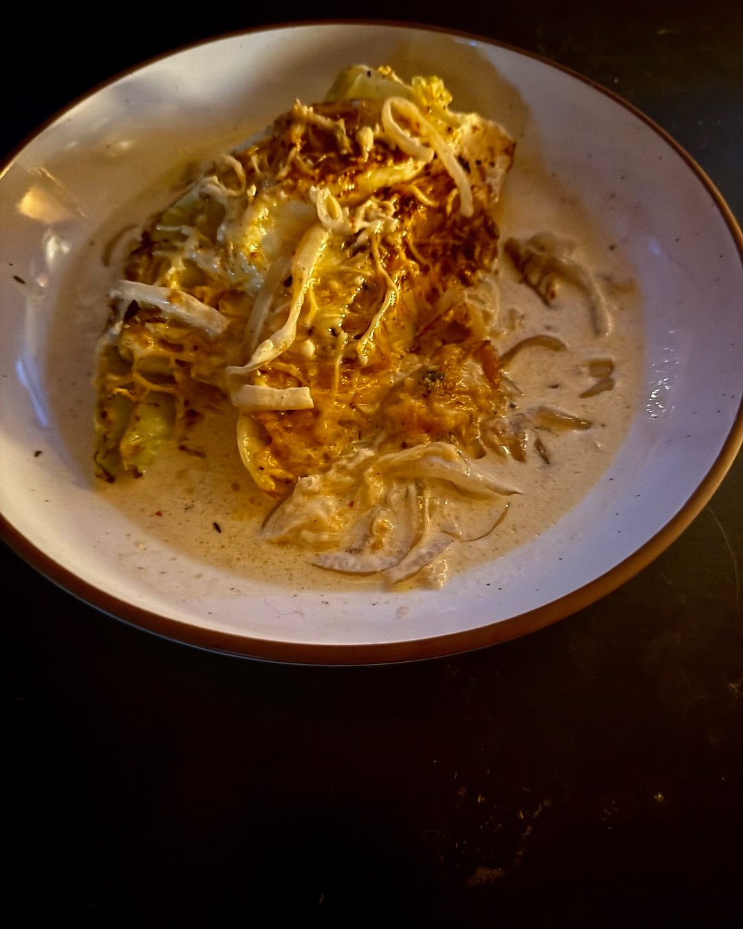 Creamy Parmesan Cabbage — wedges, parmesan cream, and a touch of Cajun spice. Perfect for easy dinners or a show-stopping side. Full recipe on the blog. Link in Bio #CreamyParmesanCabbage #CabbageLove #EasyRecipes #DinnerIdeas