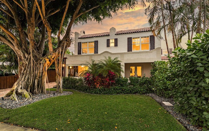 130 Greenwood Dr, WPB, 33405. This 5 bed/4.5 bath home is just under 4,000 sq ft but has an even larger yard! Listed at $3.2M! #palmbeachporches #wpbrealestate