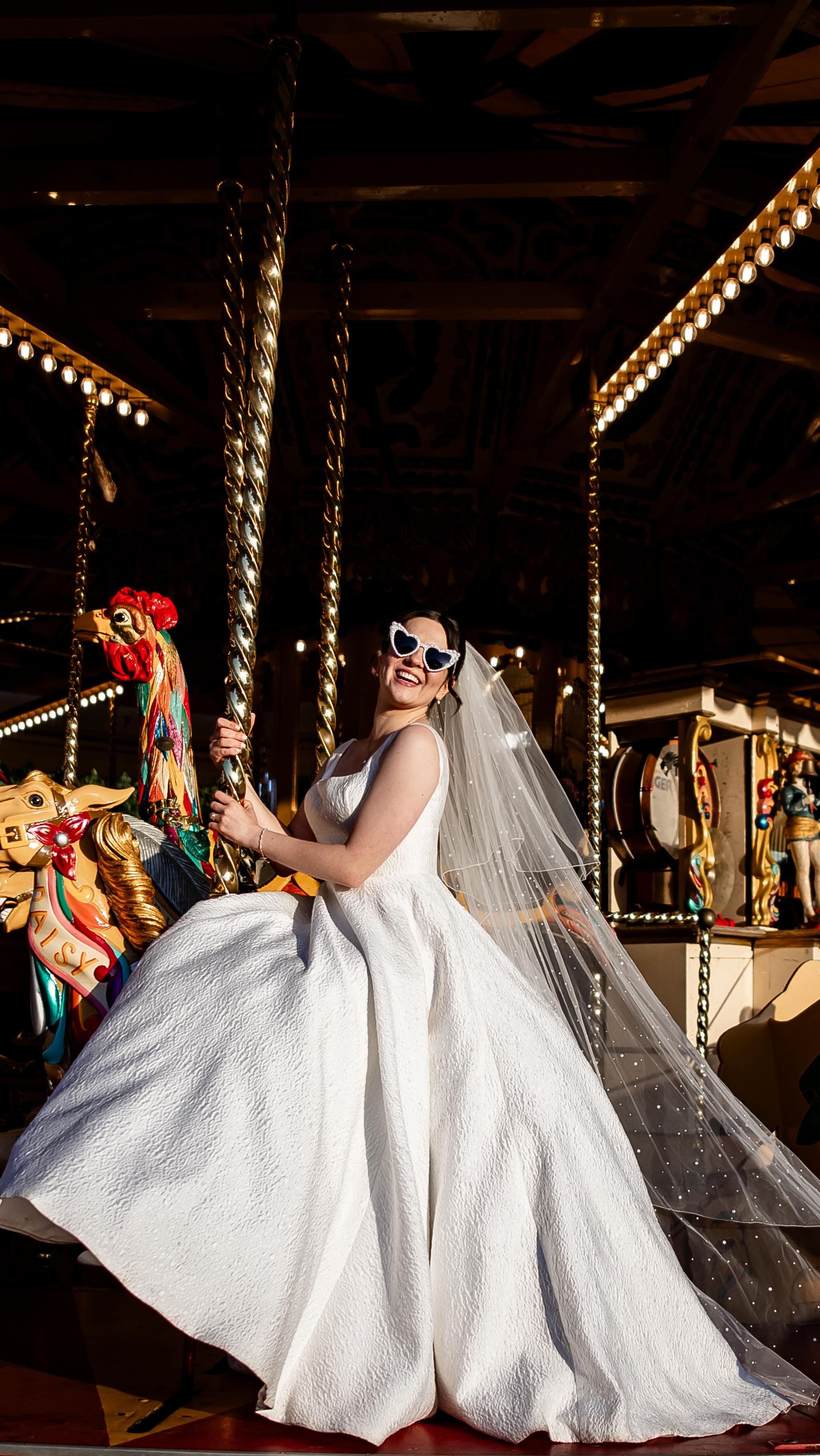 Nobody talks about this moment enough…
After months of spreadsheets, seating plans, and “what if it rains?”
When the planning stress melts away.
When the timelines don’t matter anymore.
When you suddenly realise “I just married my best friend.”
Now it’s golden hour, on a carousel, veil flying, heart full, and the party is just getting started.
This is the bit they don’t tell you about.
The calm after the chaos.
The “we did it” glow.
If you want photos that feel like this, joyful, real, and completely you, I would love to hear about your plans!
#shotbypinky 🎠️ #pinkypromisephotographyuk
📸 @pinkypromisephoto
C’s outfit and shoes: @peddars.sudbury @peterposhsuit @drmartensofficial
M’s dress: @broomvalebridalbarns @fredabennet
Venue: @bressinghamhall & @bressingham_s_g
Hair: @hairforyouroccasion
Makeup: @brodiemakeup
Flowers: @peony.andpeach
Cake: @marksandspencer
Rings: @gtydemanjewellers
Confetti: @confettibee_uk
DJ: @ksdevents1
Video: @heartwoodweddingfilms
Artist: @artworkbycarolannhinson
@morgiejade97 🤍 @cheggo_leggo
Bressingham wedding photography | Fun Norfolk photographer
#bressinghamhall #bressinghamhallwedding #bressinghamhallweddingphotographer
Helen is a published fun and inclusive wedding photographer based in East Anglia (Norfolk and Essex), also covering events in London, Cambridgeshire, Suffolk, Kent and beyond. With a relaxed and unposed approach offering colourful authentic imagery of folks in love having their best day!
📍 Captured at Bressingham Hall and High Barn wedding venue, in the heart of Diss, Norfolk