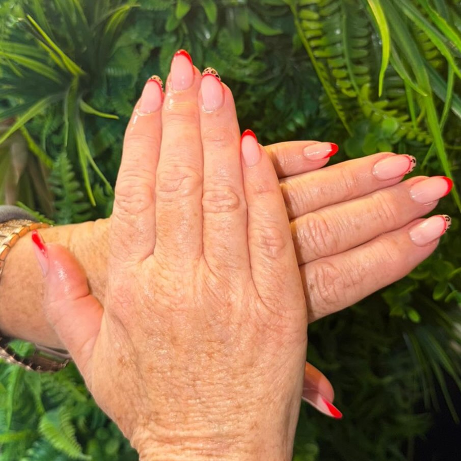 French tips… but make them fierce ❤️🐆
These gorgeous nails by Senior Beautician Jemma feature a soft nude base paired with bold red French tips for that classic, elegant finish. To add a playful twist, we mixed in a leopard print French tip design with delicate spotted detailing, giving the set a fun statement accent.
The combination of neutral nude tones, vibrant red tips, and chic leopard patterning creates the perfect balance between classy and wild. Subtle detailing and clean shaping keep the look polished while the animal print adds personality.
A modern take on the French manicure with two different tip styles in one set — timeless red and trendy leopard. Which one would you choose? ✨💅