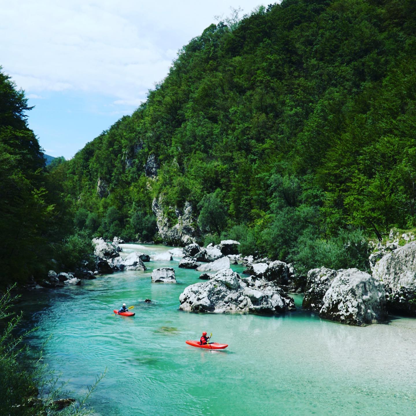 We finally got our grumpy driver Ana on the river. She is still grumpy but absolutely crushes it in a kayak. #kobarid #slovenia #soča #kayaking #whitewater #whitewaterkayaking #socavalley @kobaridkayakschool @kampkoren @sandiline_official @exo_kayaks @ophion_paddles