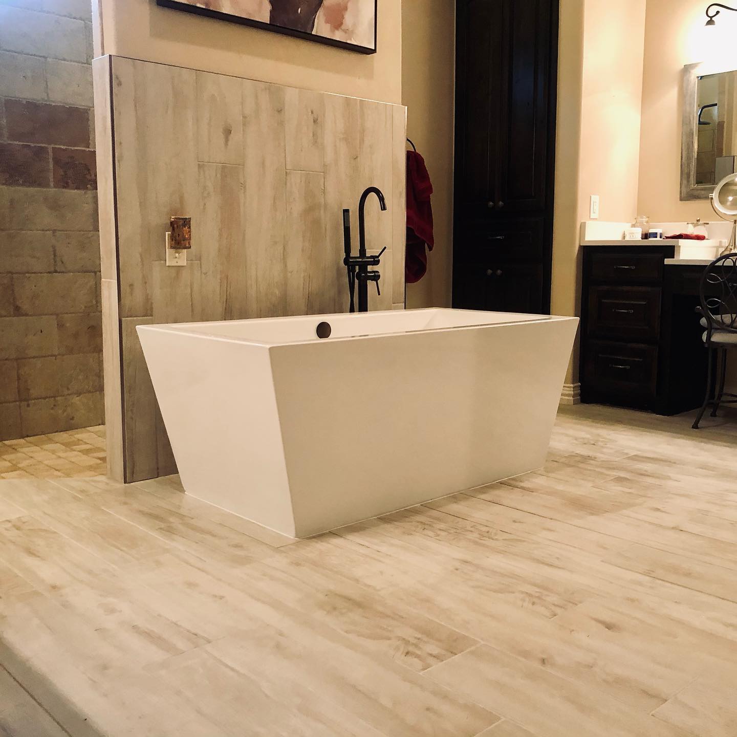 Partial Master Bath Renovation - LFT Porcelain tile with free standing tub and quartz on countertops. #tile #renovations