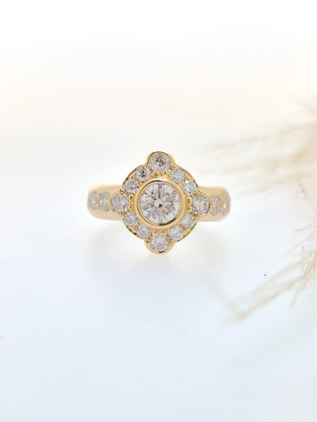 Sometimes you need a little change. This ring has been made from an old wedding ring and engagement ring set. It has been transformed from white gold and defined edges to a earthy halo yellow gold ring. This ring encompasses a life tine of memories into one statement ring.
#localjeweller #diamondring #handmadeengagementring