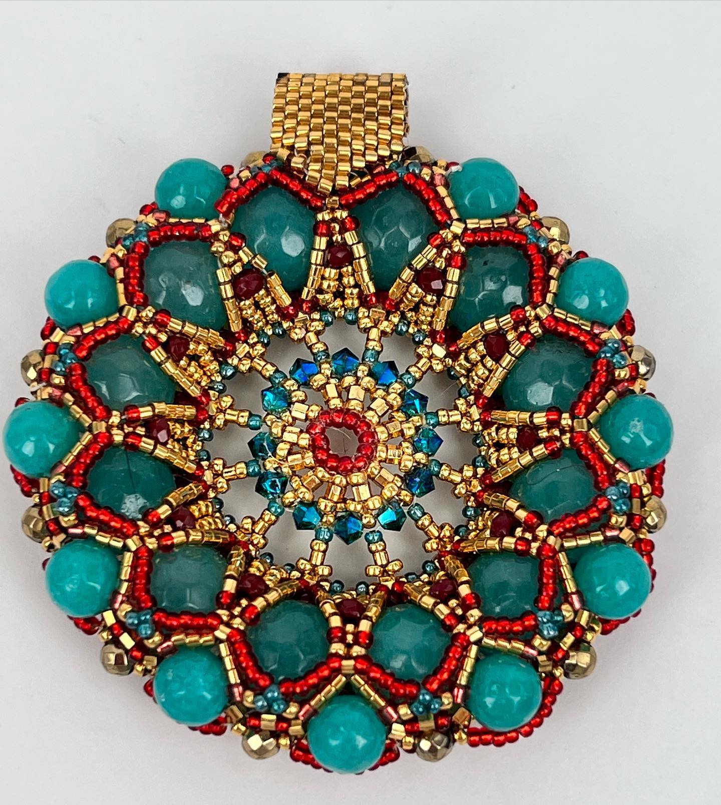 Ready for spring and colorful blooms? I know I am!
#beaded #handbeaded #handmadejewelry #beadedjewelry #artizan #handmadejewelry #pendant #handbeadedpendant #gold #turquoise #swarovski #swarovskicrystals #seedbeads