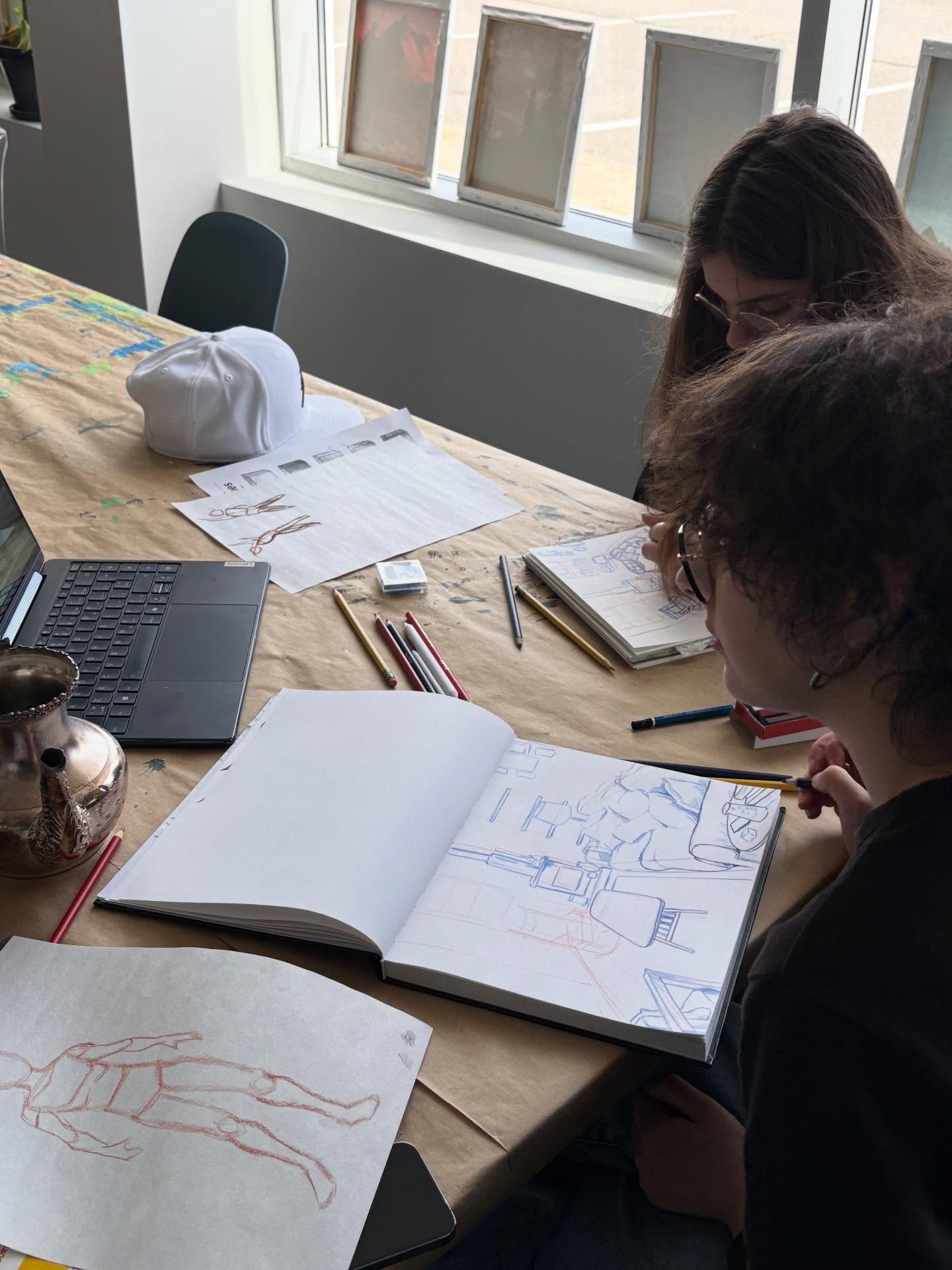 Sofia working with one of our students on perspective and figure drawing fundamentals as she prepares her high school art school portfolio