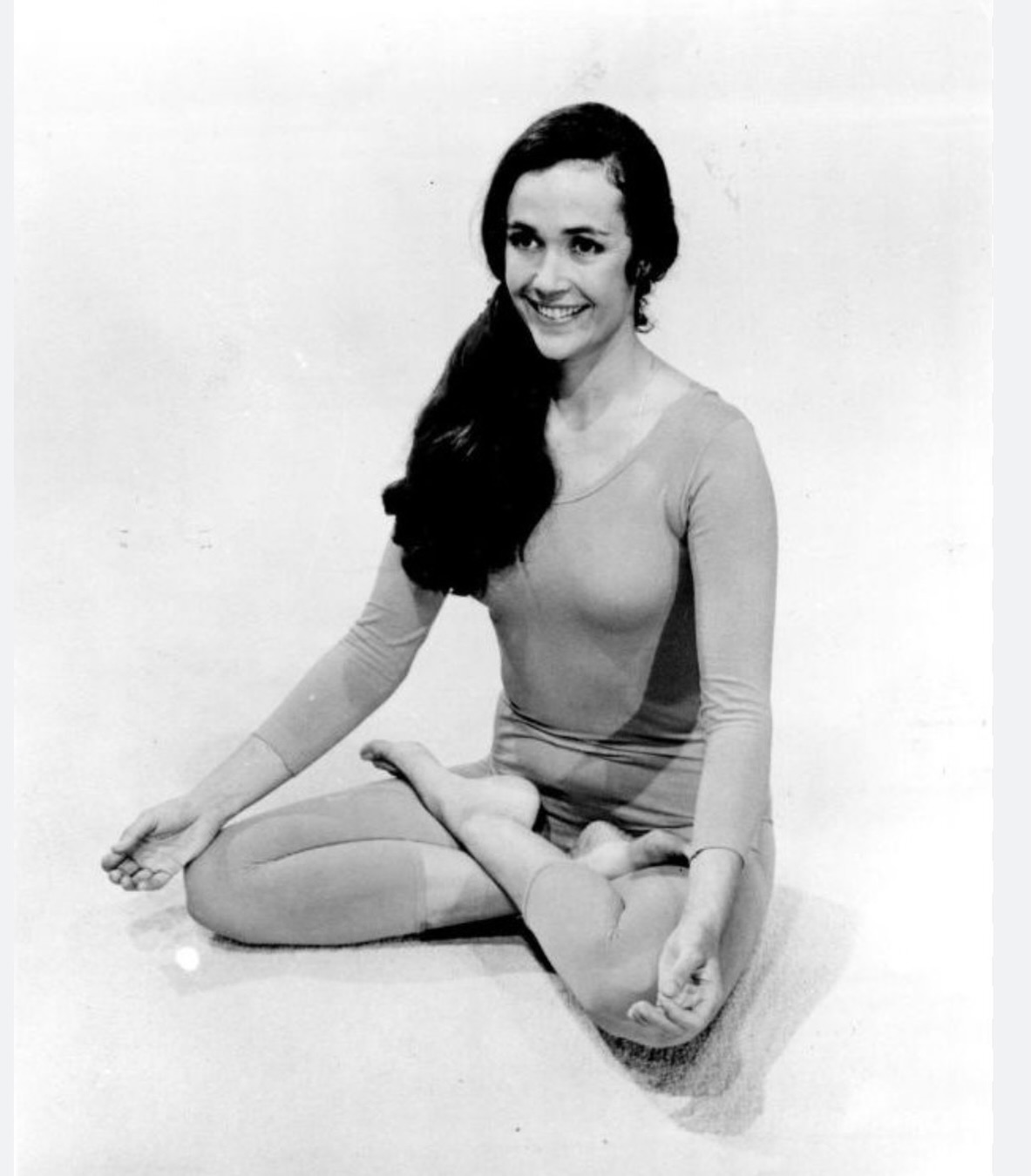 Today we honor the life of Lilas Folan, a teacher whose quiet wisdom helped shape the practice of yoga for countless students around the world.
I first watched Lilas teach at a time when very few people in the west even knew what yoga was. Long before studios appeared on every corner, she was already sharing its depth and dignity with patience, clarity, and devotion. Many people first encountered yoga through her programs on PBS; a reminder of how important public broadcasting has been in making thoughtful, educational programming available to everyone.
There was something extraordinary about witnessing that early transmission, when yoga still felt like a quiet, almost hidden path being carried forward by sincere teachers like her.
Lilas brought humility, steadiness, and compassion to everything she shared. Through her teaching, writing, and presence, she reminded us that yoga is not about performance or perfection, but about returning again and again to the heart: steady breath, attentive awareness, and kindness toward ourselves and others.
Many remember her not only for her deep knowledge of the tradition, but for the way she embodied it: grounded, thoughtful, and deeply human. She helped bridge classical yoga philosophy with everyday life, guiding generations of practitioners toward greater clarity, steadiness, and inner freedom.
Though she has left the physical world, the spirit of her teaching lives on in every quiet moment on the mat, every sincere breath, and every act of compassion inspired by the path she loved.
May her memory continue to inspire the practice of yoga as a path of wisdom, humility, and love. 🕊️🙏