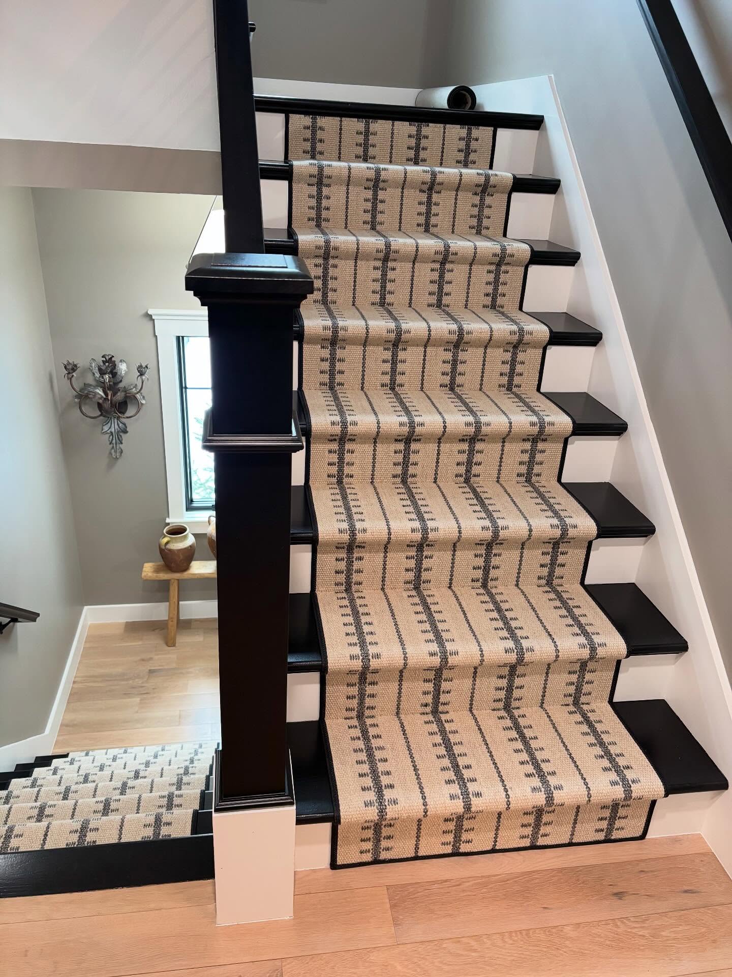 What a statement on these stairs! Ticking Stripe by @stantondesignco offers just as much durability as it does sophistication.
Color // Tuxedo
#justinstalled #stairrunner #stairsofinstagram #woolcarpet #carpetbinding #blackandwhite #handloomed #interiordesign #luxurydesign #plymouth #pinehills