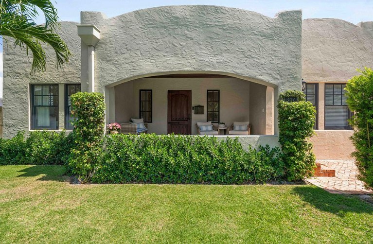 347 Plymouth Rd, WPB, 33405. This beauty has a front porch to die for - a porch is a rare thing to find in South Florida! #palmbeachporches