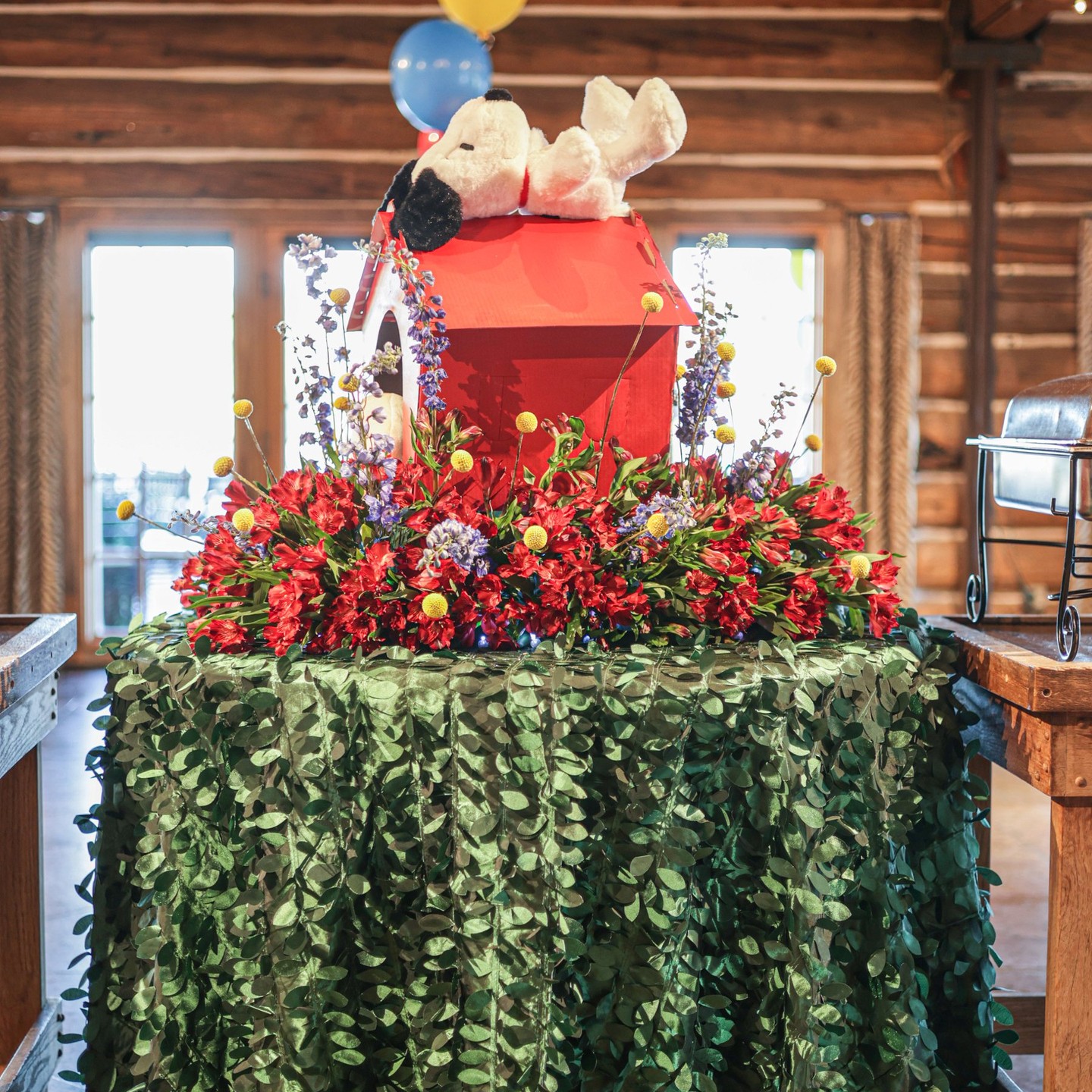 Snoopy's Doghouse...if he lived on a bed of ruby red alstromeria!
Photo @sarahbakerphotos
