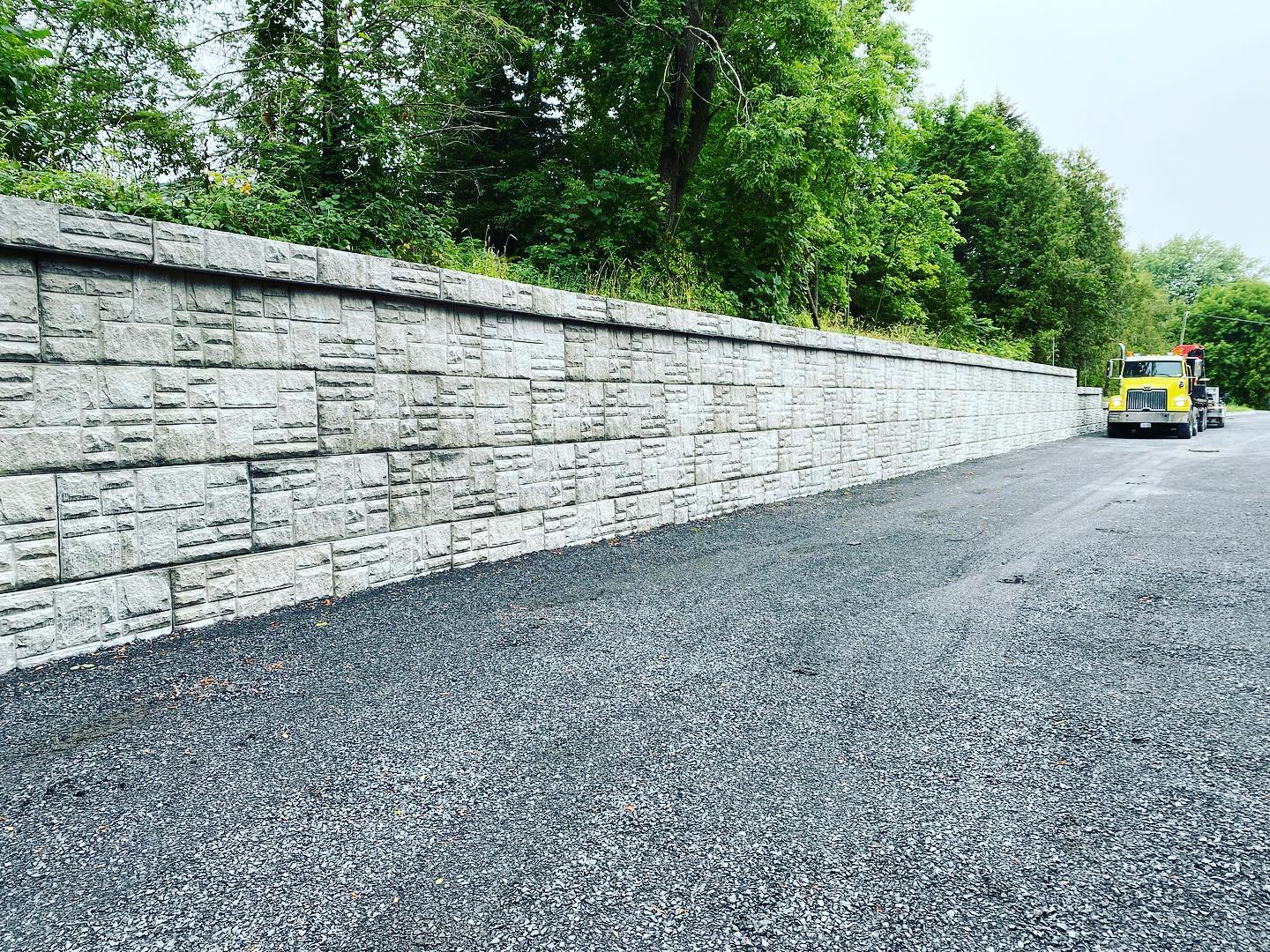 Check out this nice retaining wall we did this past summer! Contact us for pricing and availability