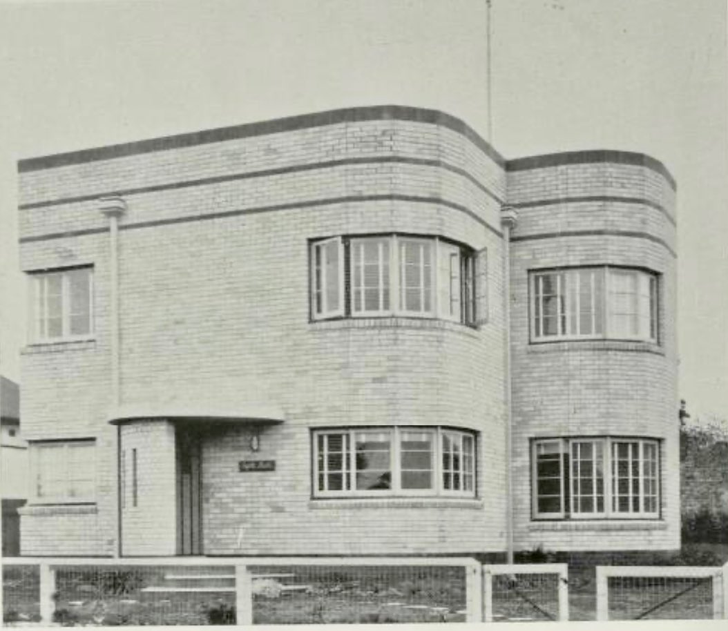 Revisiting an old project … The aptly named Eight Bells, out at Collaroy, built 1939/40 as a stylish Moderne/Functionalist ‘weekender’. Ultra modern for the time… steel-framed windows, effectively flat-roofed, mostly cream brick with recessed buff tinted joints, open plan. In August 1940, the influential magazine ‘Building’, ran a feature piece on Eight Bells: ‘the nautical aspect is apparent throughout ... The name is executed in rope near the front door, the lighting fixtures are nautical, while a real ship’s bell provides the summons to meals. Designed as a seaside residence ... Externally, the important corners are polygonal, thus facilitating windows and brickwork construction and giving a similar effect to the curved corner. In order to protect the entrance from the weather, a shaped brick wall, covered by a concrete hood has been incorporated.’
The architect, Thomas David Esplin (1903-70), was the son of Donald Thomas Esplin (1874-1960), of Esplin and Mould—an active partnership in interwar Sydney—responsible for Astor Flats in Macquarie Street (1920), the first cooperative title flats and reinforced concrete high-rise in Australia. Thomas’s output is not well documented, although at least with Eight Bells, he appears to have followed in the progressive design mould of his father.
Regretfully, the walls were rendered in the late 20th century.
Images:
Decoration and glass, vol. 10, no. 5, January – February 1945
Sydney Morning Herald, 22 November 1938
Building, 24 August 1940