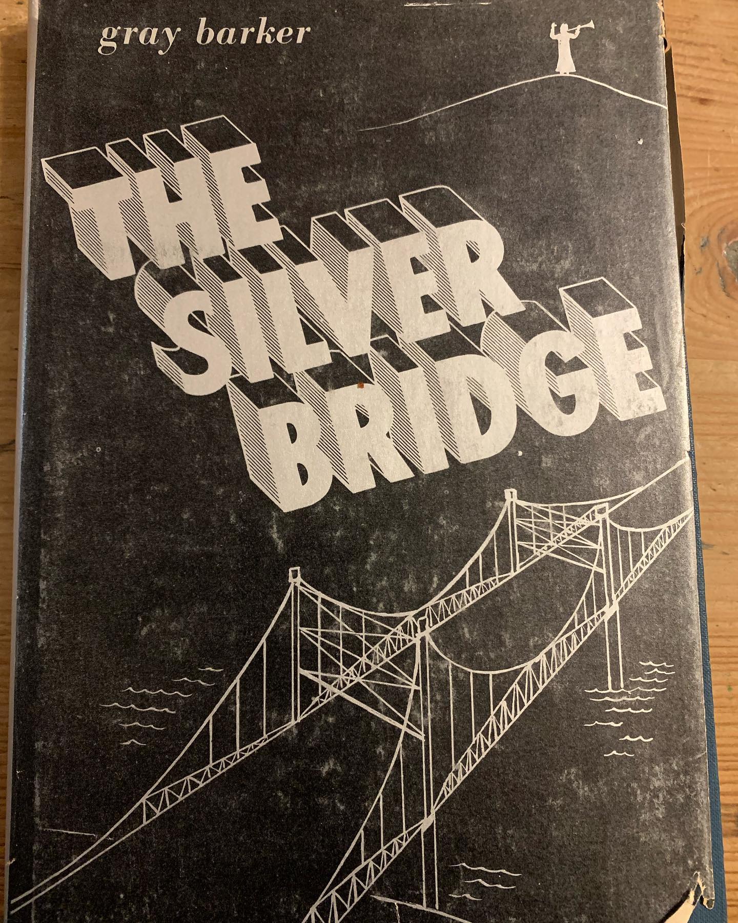 “Silver Bridge” Gray Baker, Saucerian Books, 1970
Published in 1970 “Silver Bridge” would take the title of the bridge from Point Pleasant, WV. Along with a illustration of the same Silver Bridge for it’s first edition dust jacket.
The book would be the first of it’s kind dealing with the events leading up to the Silver Bridge Collapse and the encounters with people from space?, strange lights, Men In Black, and of course the Mothman which the book is dedicated to.
For many years out of publication, it seldom dropped below $100 for a first edition, a period book, a staple of UFO lore, and most importantly the first book.
While the book deserves a serious deep dive the nugget often overlooked is John Keel actually wrote an entire chapter for Silver Bridge without taking credit.
While researching Mothman in 2000, I tried to check out the copy at the Huntington WV public library and was told by the librarian in charge of books in the special collections that “the book had nothing to do with the bridge collapse and was all about UFO’s written by a crack pot.”
eBay has a first edition listed for $495 while Amazon is asking $1424.95!
First edition from the collection of @markmayrobots