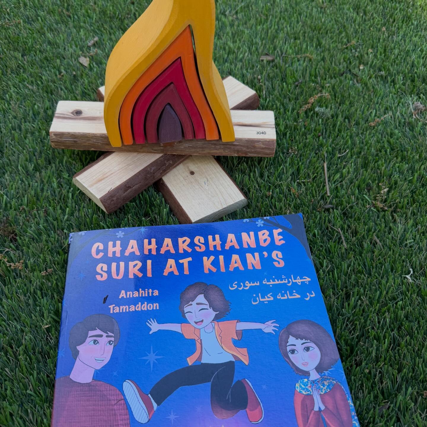 Chaharshanbe Soori: Lighting the Way to a Bright New Year! Happy Chaharshanbe Soori!// Happy Chaharshanbe Soori! The Persian Festival of Fire marks the start of the Nowruz celebrations, bringing warmth, light, and a fresh start. On this special day, usually a Tuesday or Wednesday, you might see bonfires in public spaces, alleys, in front of homes, and sometimes parks. Jumping over the flames is a symbolic act: letting go of pain, worry, unhappiness, and sickness, while welcoming health, light, and joy.
Children join in the celebration by singing traditional songs:
“Zardi-ye man az to, Sorkhi-ye to az man!” Fire, take all your sickness away! Fire, give us your health and wealth!
“Sorkhi-e toe az man, zardi-e man az toe!” Give me your vibrant red color and take my pale yellow color away!
At our celebration, we first explored the tradition through reading the book Chaharshanbe Suri at Kian’s: In English & Farsi Paperback by @anahitatamaddon where eight year old Kian, feeling down after a rough day, rediscovers hope, courage, and the joy of family and tradition while celebrating the magical Persian festival of Chaharshanbe Suri. After reading the book, we placed our @guidecraft_official natural wooden blocks and @grimmswoodentoys wooden fire nesting blocks, and they each jumped over fires! Each jump was a joyful leap into new beginnings. #tinkerwonderplay #chaharshanbesoori #nowruz