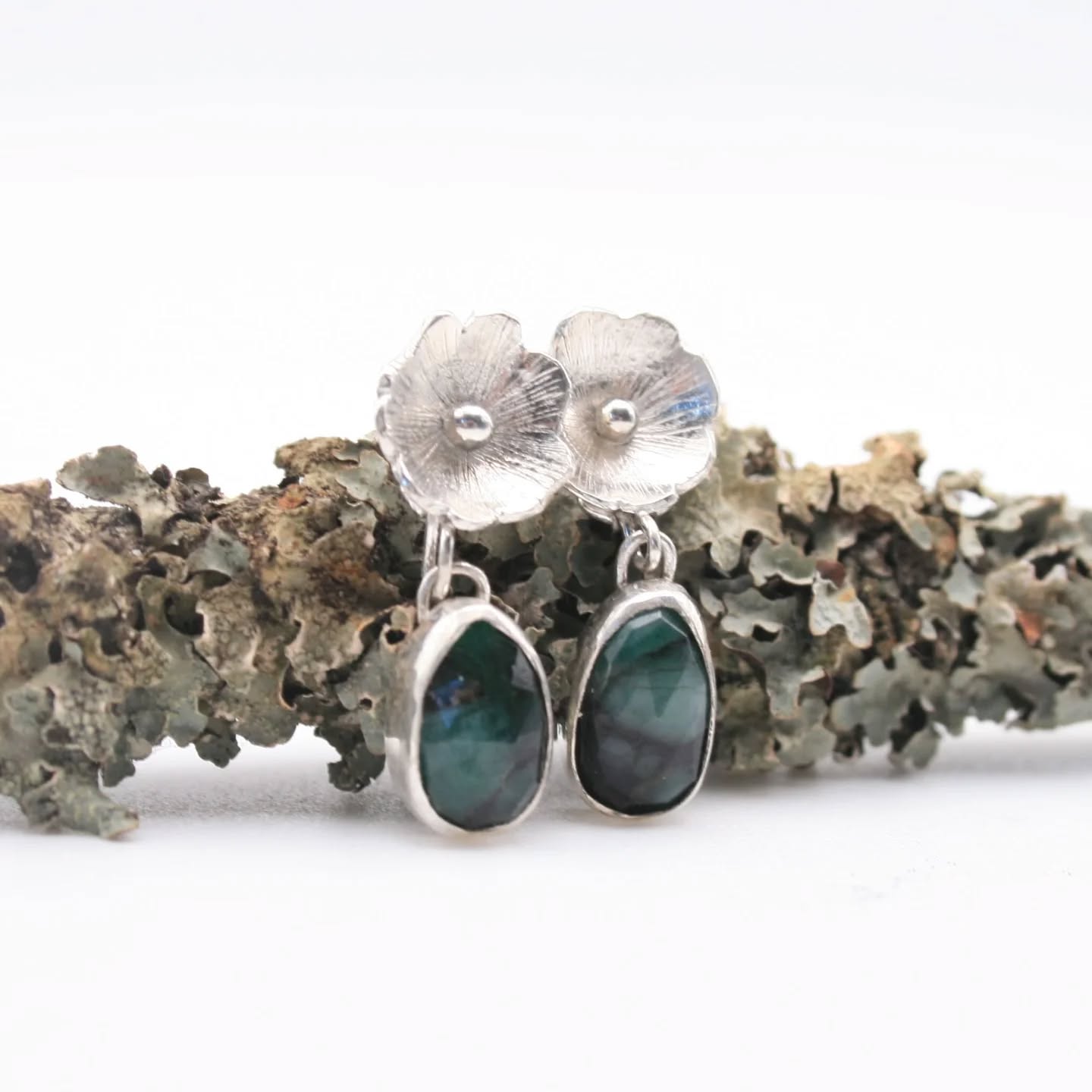 ⭐ ⭐ ⭐ NEW EARRINGS ⭐ ⭐ ⭐
I’m totally in love with these emerald earrings. The beautiful gemstones are irregular in shape and have black inclusions that make them entirely unique. I’ve set them to hang beneath sterling silver flowers so they move gently when worn. I've reluctantly listed them on my website as I really can't justify keeping them for myself but I would love to!
Please get in touch if you have any questions 😊