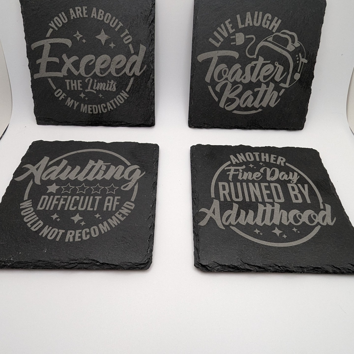 Set of 4 coasters, slate stone, laser engraved. $20 for the set, round or square. #laserengraving #xtoolp2 #xtool #sarcasm
