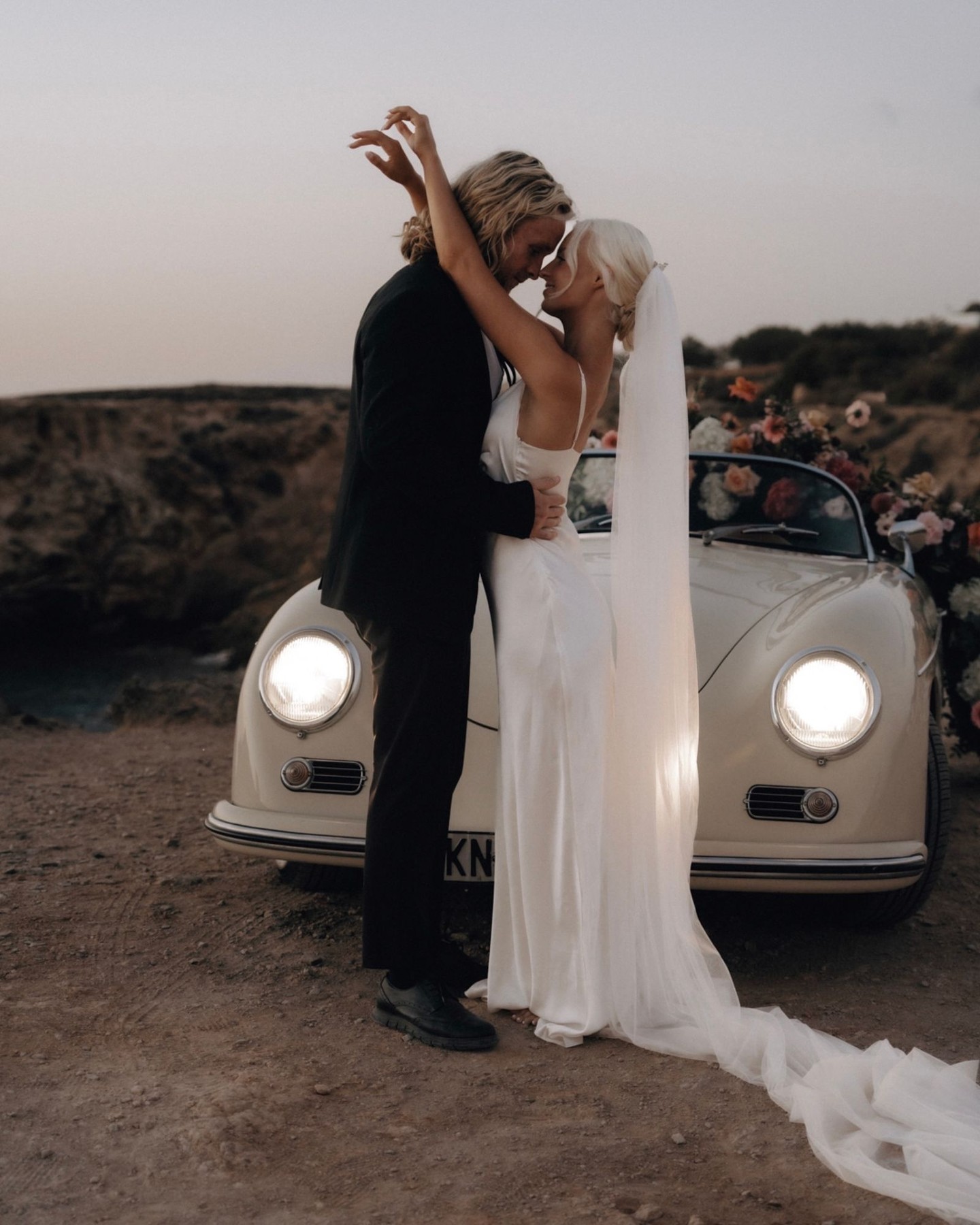 Vintage vibes and timeless love. As the day ends, their journey begins. Just the perfect shot to end a perfect day. ✨
·
FLORALS:
@chaniotis.the_flower_workshop
CAR:
@motorclubsantorini
WEDDING GOWNS:
@timeless_bridal_ boutique
JEWELRY:
@simplyswankyeg
FLAT LAYS:
@hsrgraphics
HOST
@wandering.retreats
·
#photographylovers #photographysouls #europeweddingphotographer #europewedding #destinationweddingplanners #destinationwedding #destinationweddingphotographer #weddingphotographer #elopementphotographer #frenchphotographer #editorialwedding