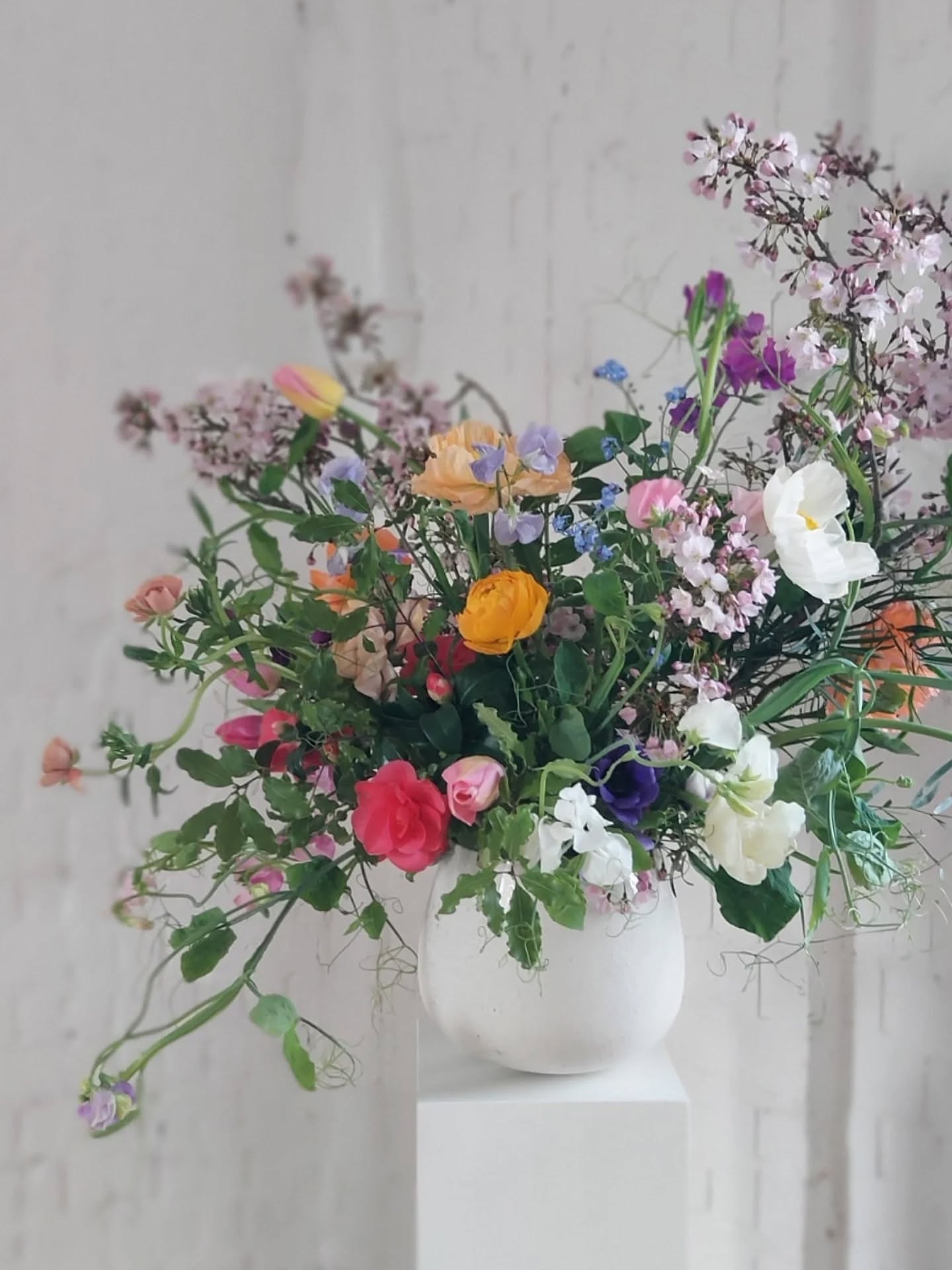 Not a traditional wedding, and that’s exactly why it worked.
Hannah and Max wanted their day at Bourne & Hollingsworth to feel relaxed, personal, and a little bit wild. so we leaned into seasonal blooms, natural movement, and designs that felt more like a garden gathering than a formal event.
We designed with intention, reused ceremony flowers later in the day, and focused on impact where it mattered most. Ensuring that their budget worked harder without sacrificing beauty.
Because modern weddings aren’t about tradition for tradition’s sake.
They’re about atmosphere.
Feeling.
And creating something that reflects you.
If you’re planning a wedding that doesn’t fit the mould
and you want flowers that feel alive, thoughtful, and truly personal. Get in touch.
Enquire now to book your consultation and start shaping your wedding flowers for your dream day.