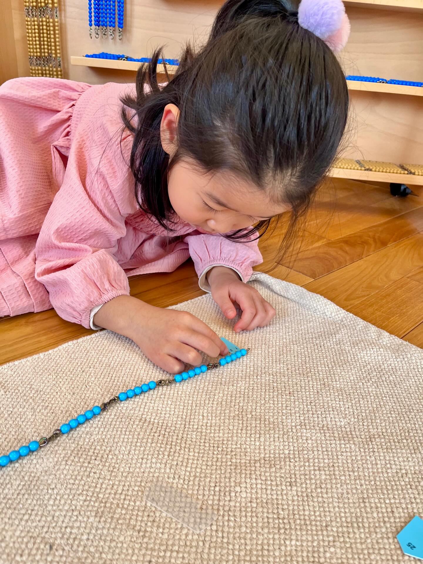 When children can touch quantity, count with golden beads, and build numbers with their hands, understanding becomes joyful and lasting. Montessori math moves from concrete to abstract with intention.
Share with a math-loving parent!